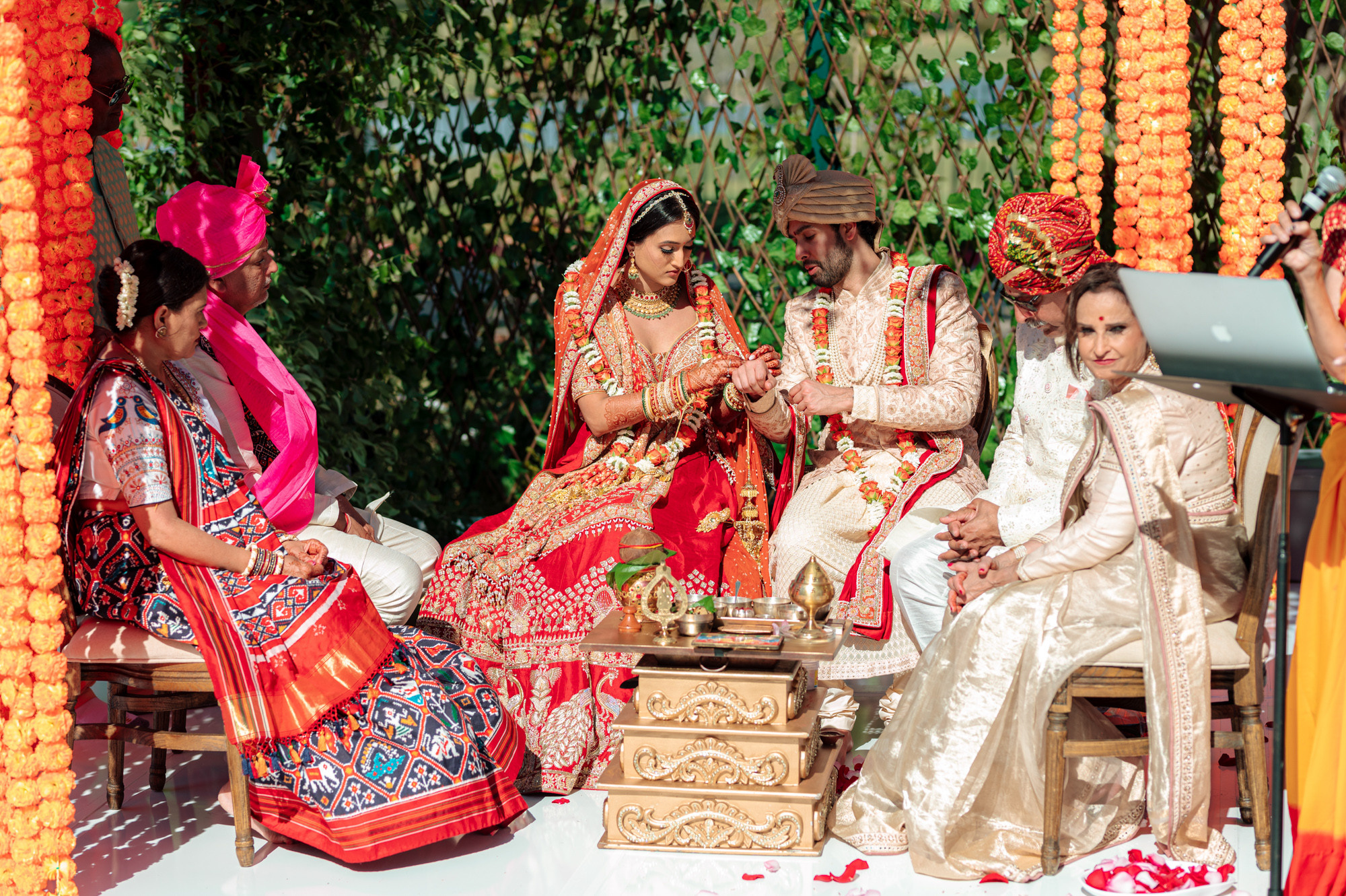 a group of people sitting on a white table