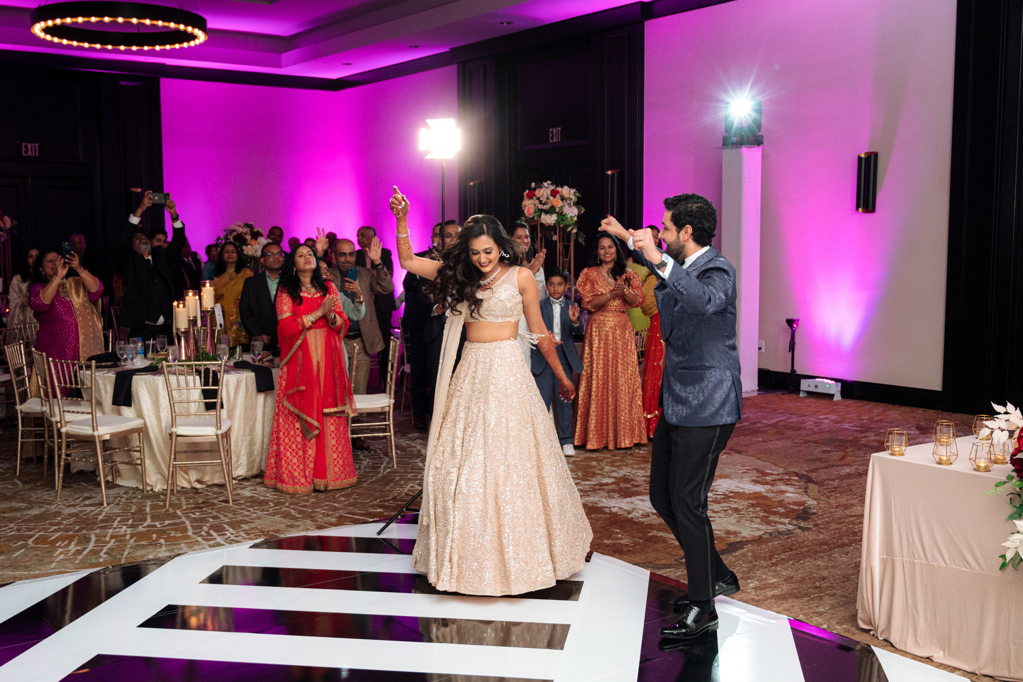 a couple dancing on a dance floor