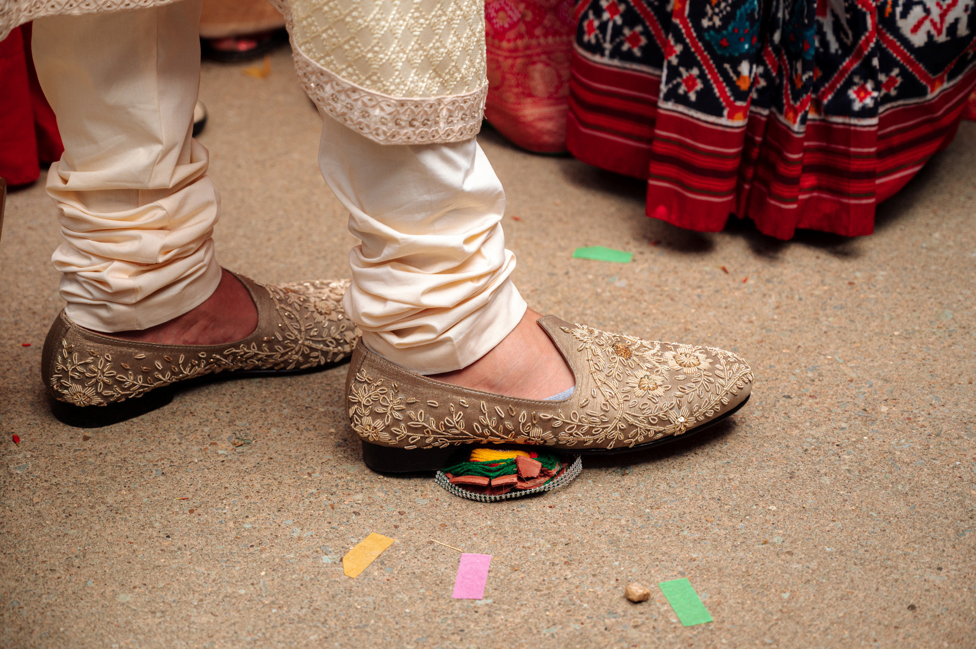 a person wearing a pair of shoes and a pair of shoes