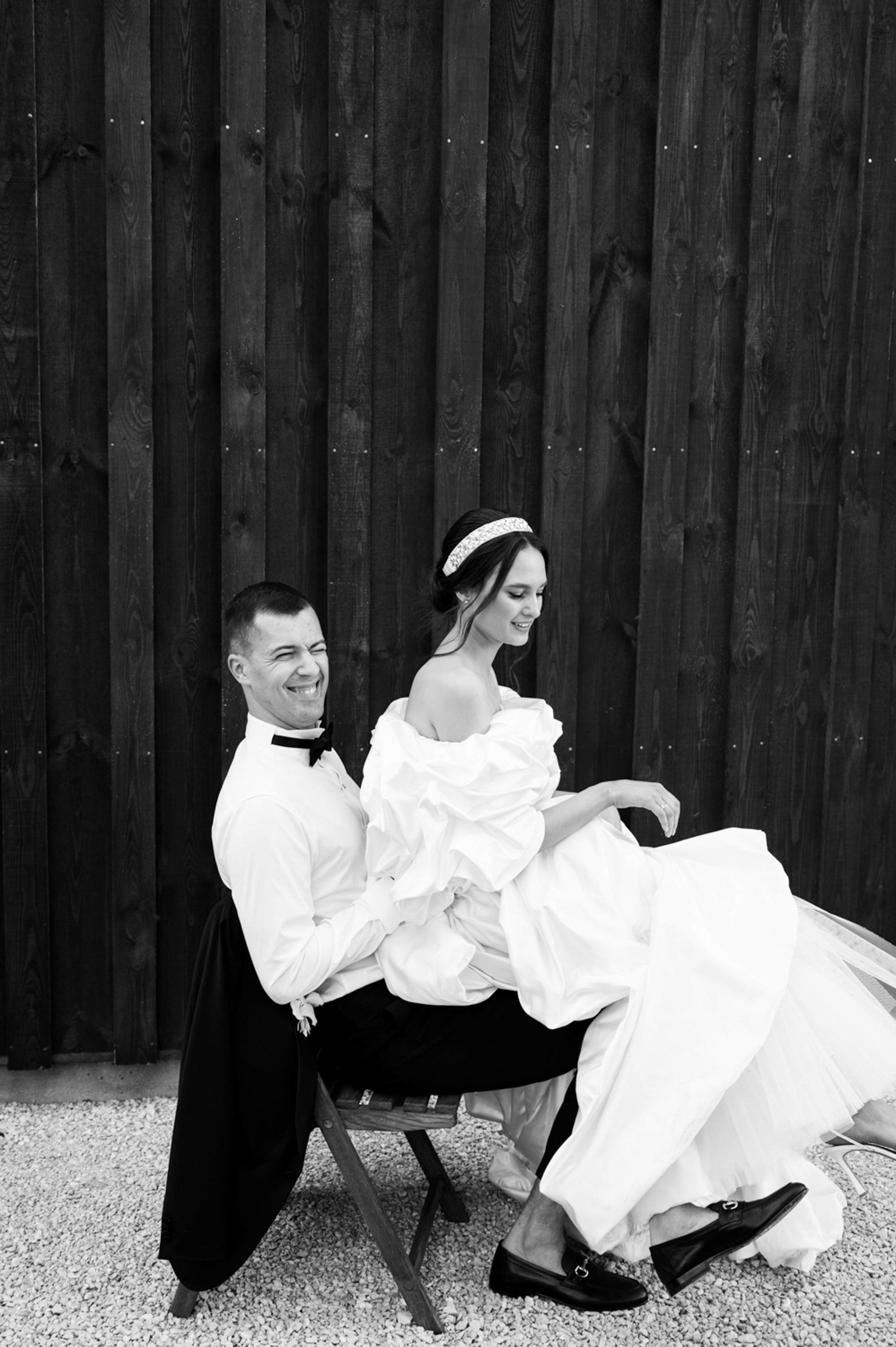 a man and woman sitting on a bench