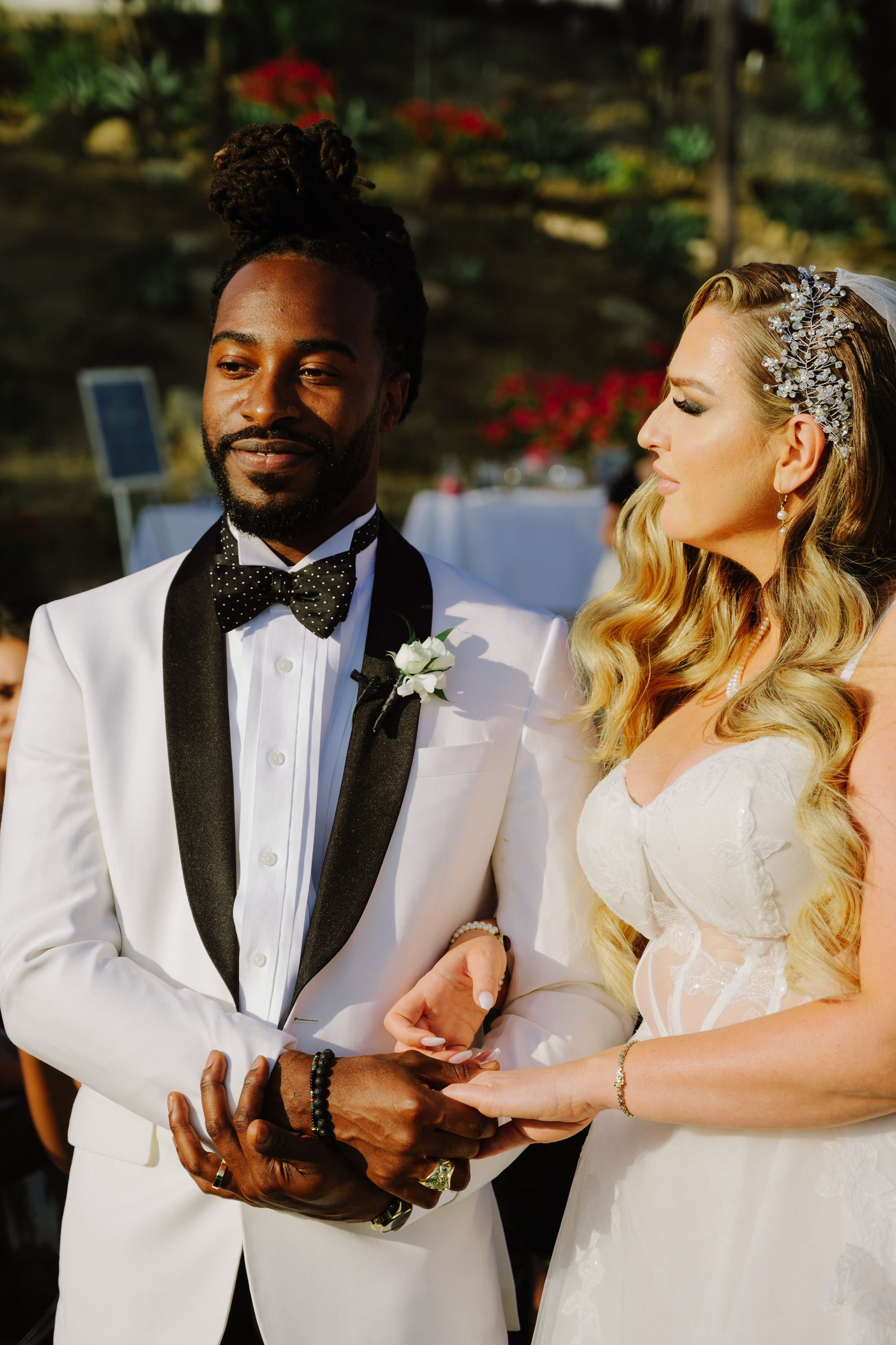 a man and woman are standing together