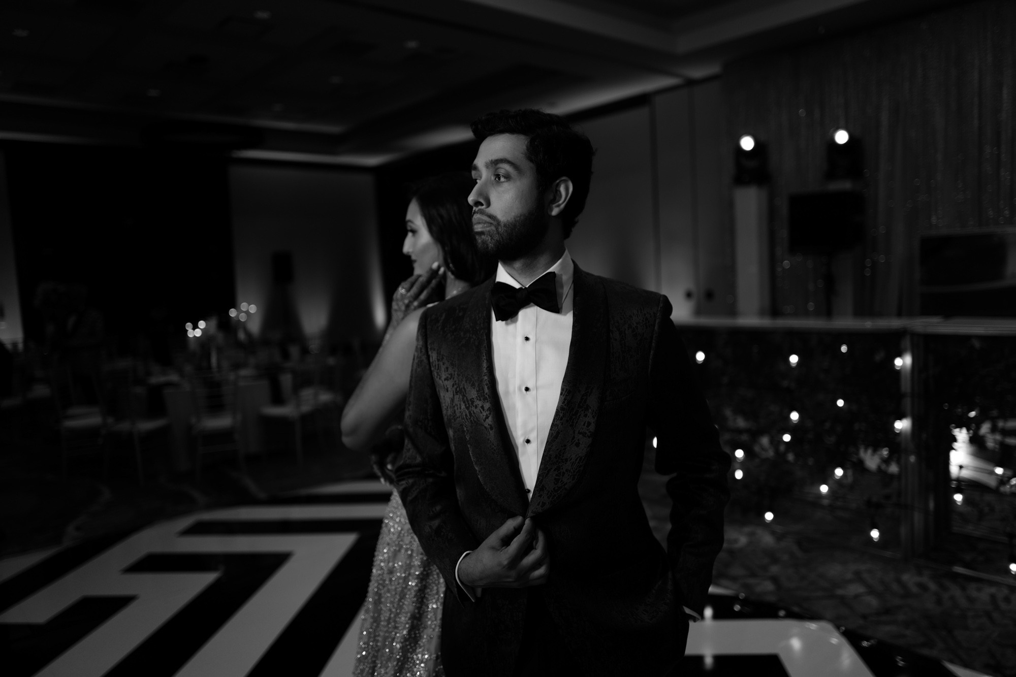 a man in a tuxed suit and bow tie