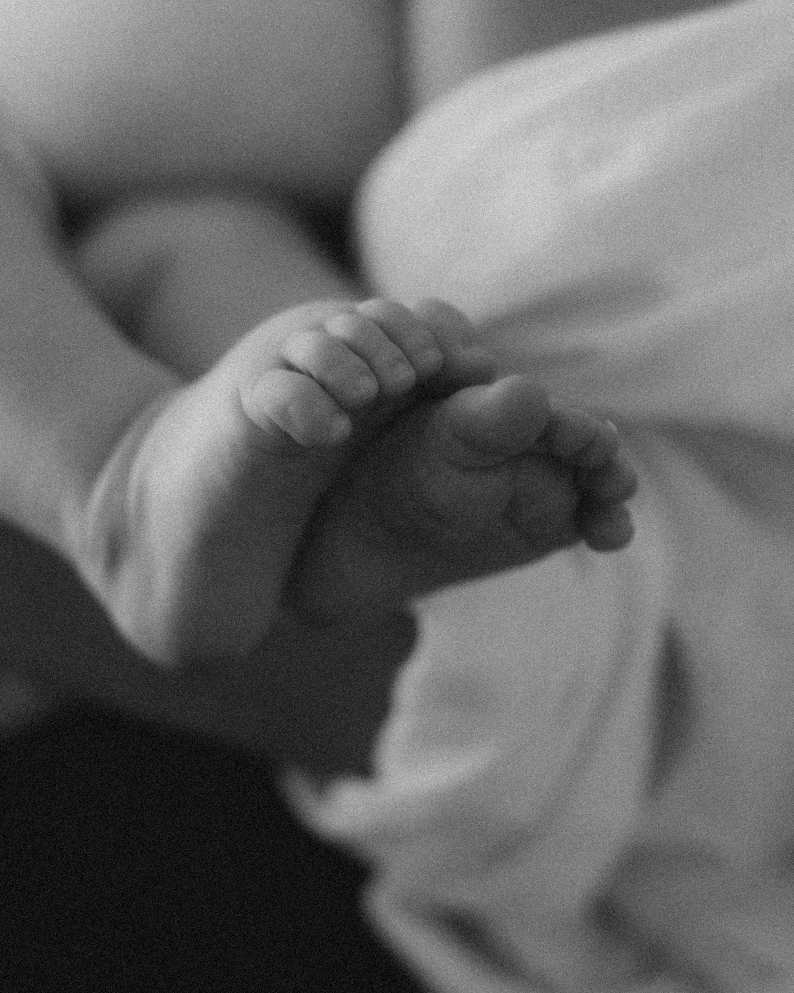 Tiny children feet in cozy atmosphere
