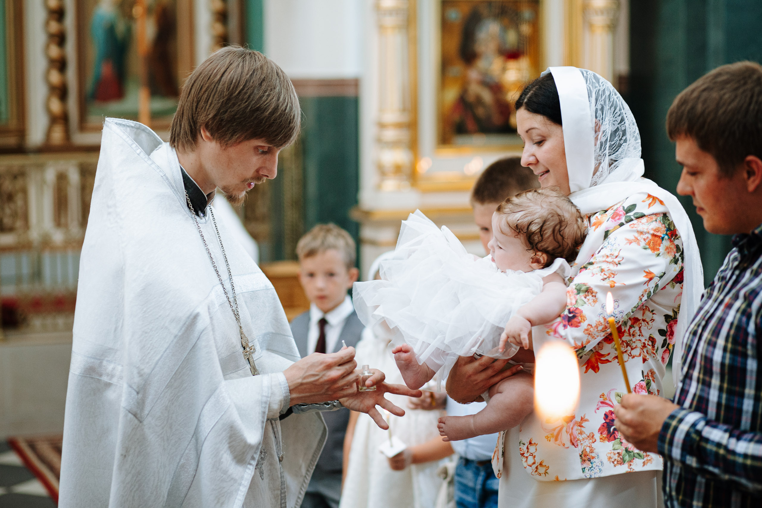 Фотосъемка крещения младенца в Риге в любой церки