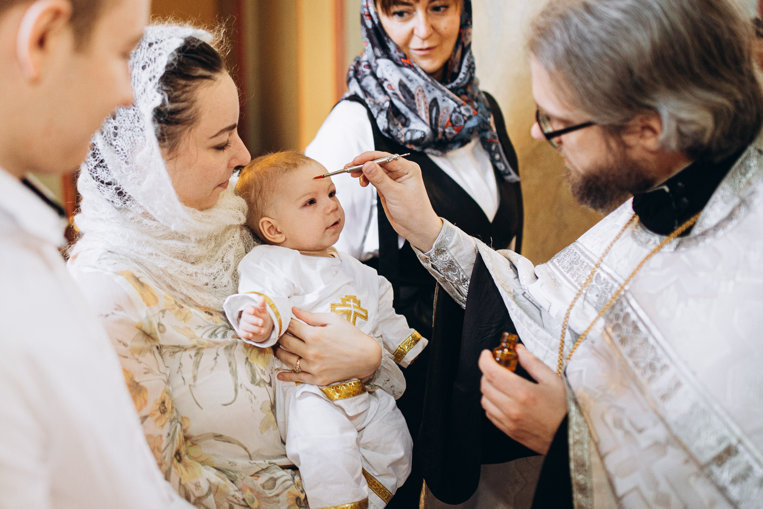 Фотосъемка крещения младенца в Риге в любой церки