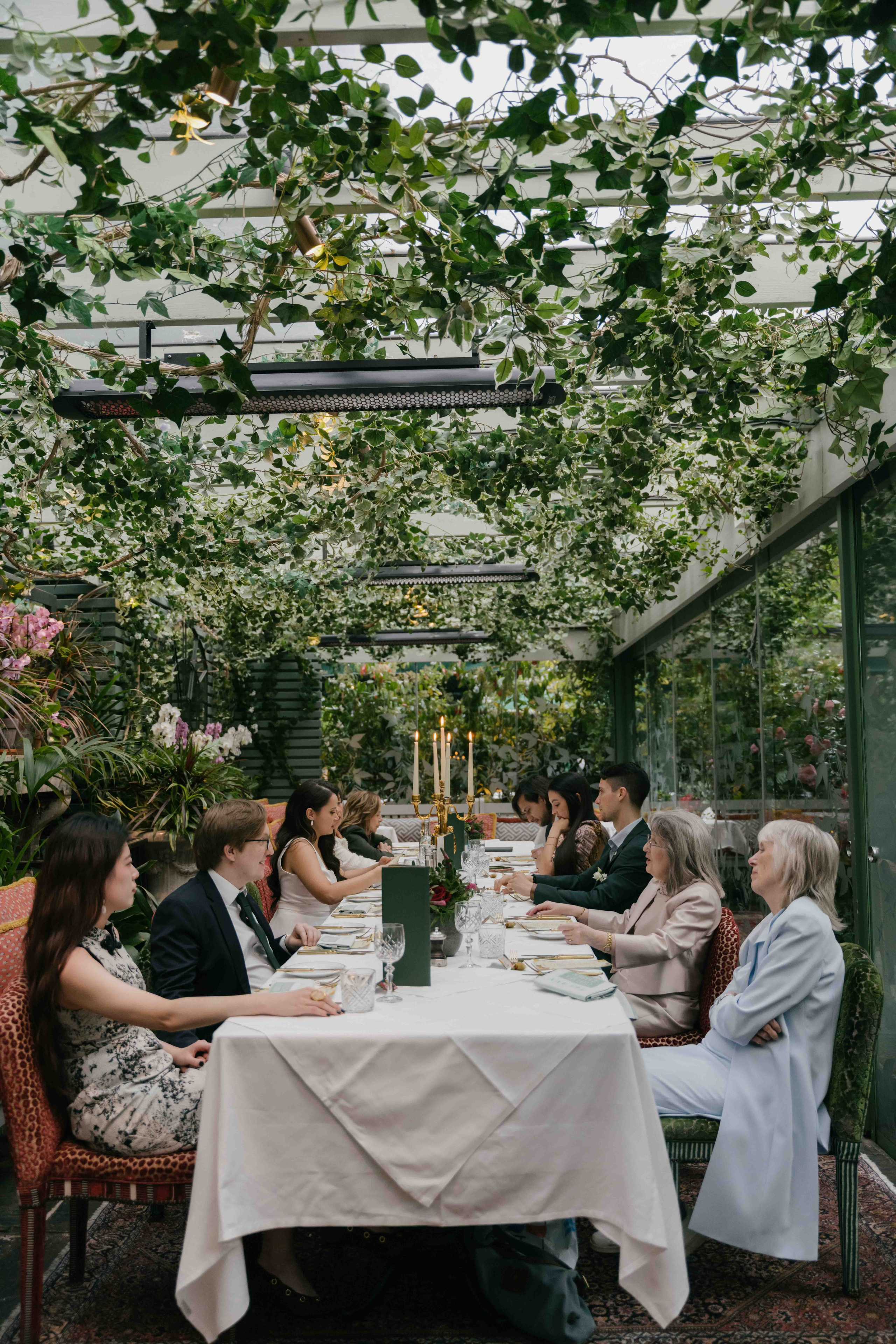 The Ivy London wedding reception, candlelight dinner, orchids and refined atmosphere