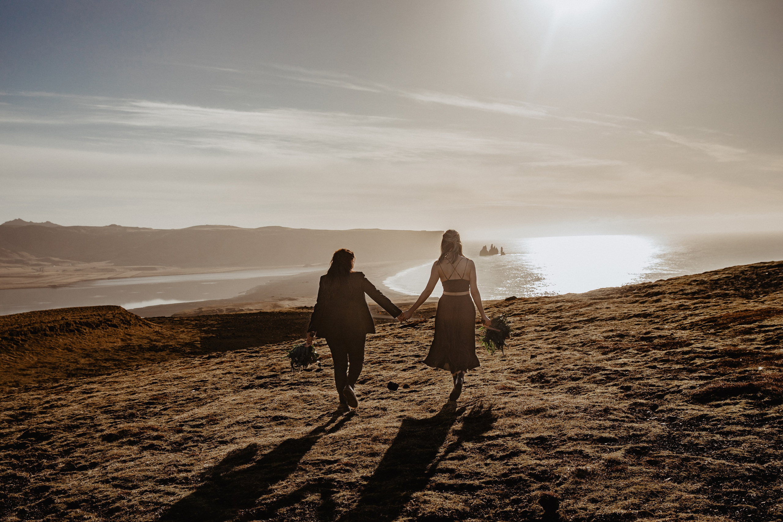 Same Sex Wedding at Iceland Black Sand Beach. Iceland elopement photographer & videographer