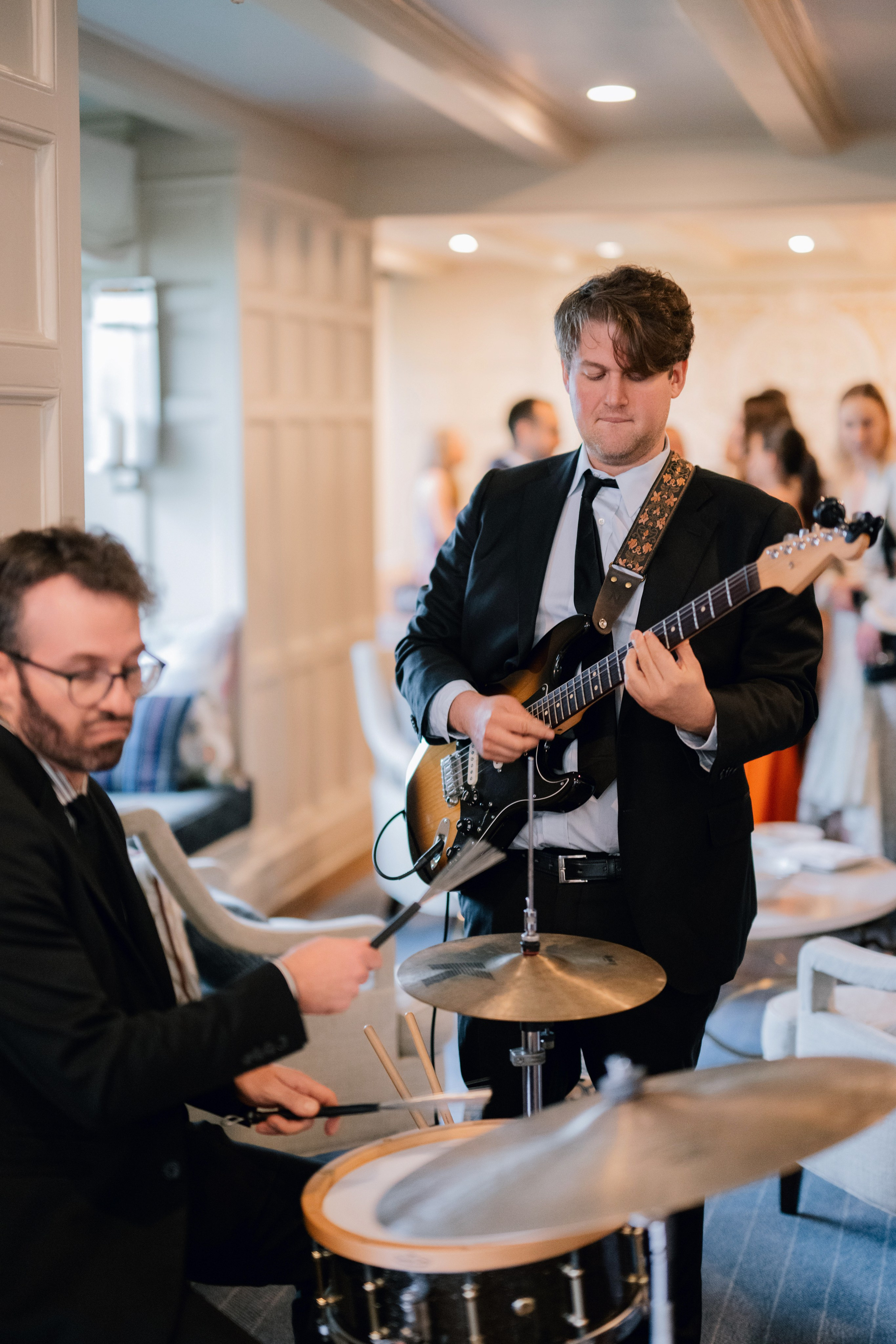 a man playing a guitar