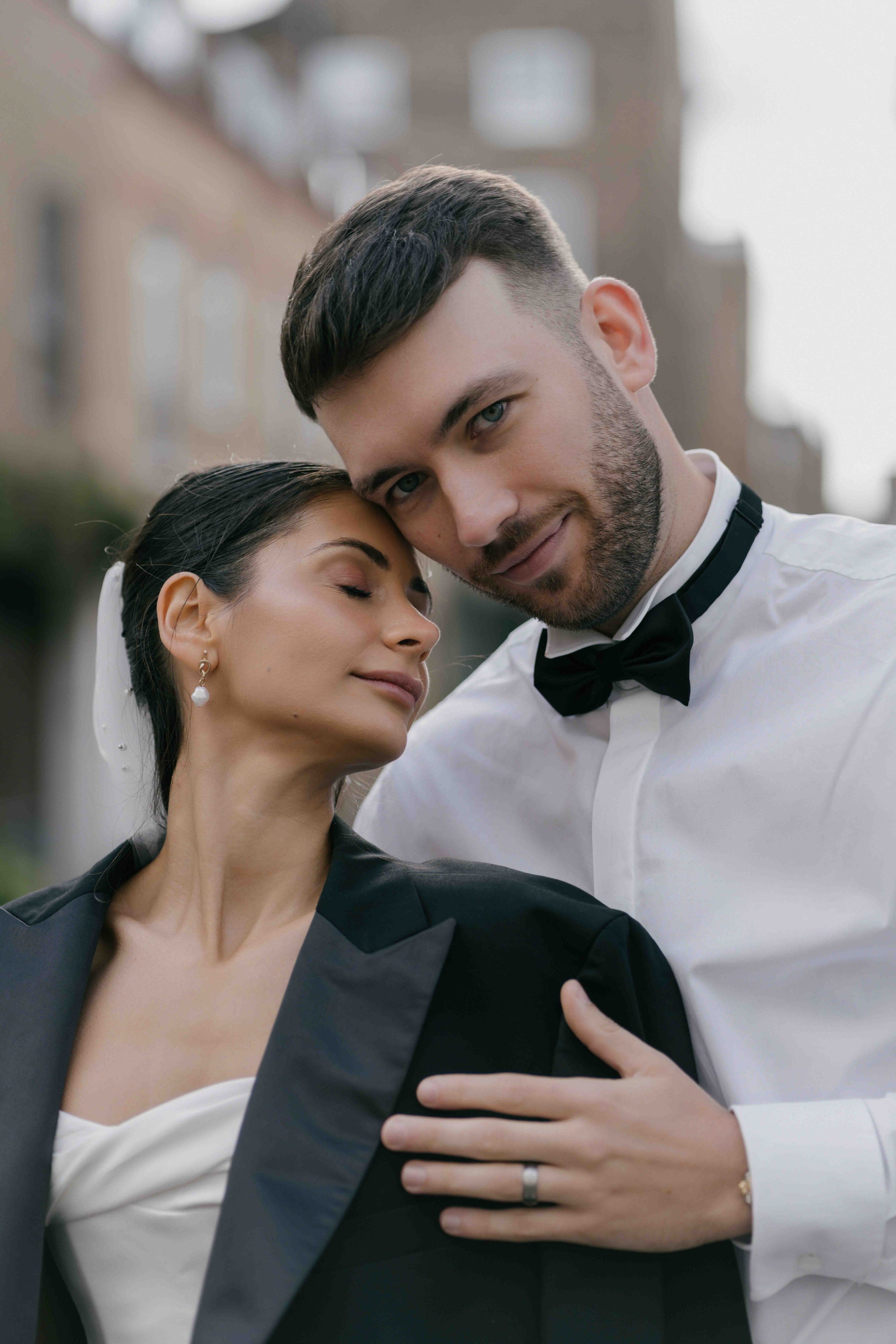 emotional wedding portrait London bride and groom close up intimate candid moment UK photographer