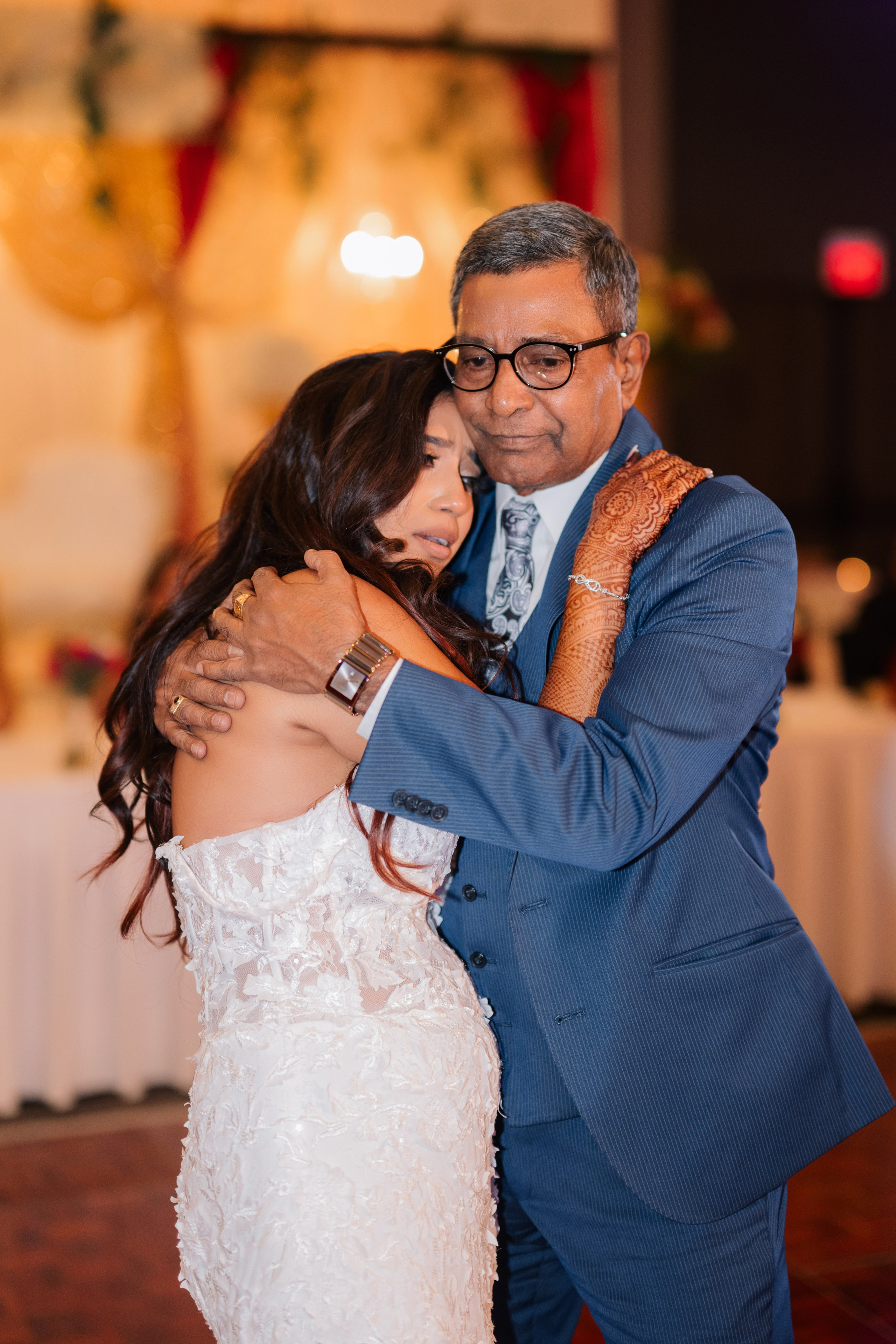 a bride and groom sharing a first dance