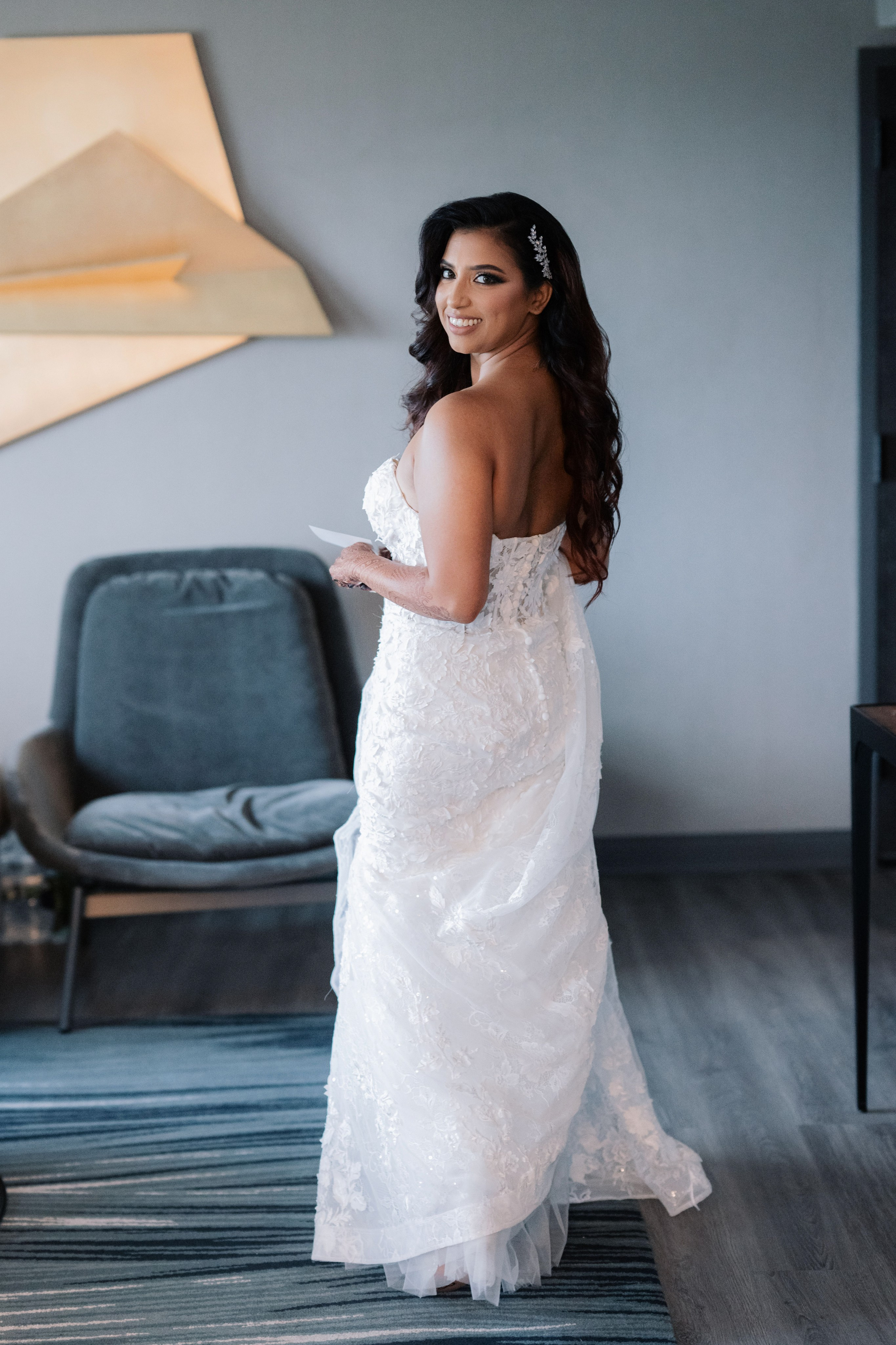 a bride in a wedding dress looking at her phone