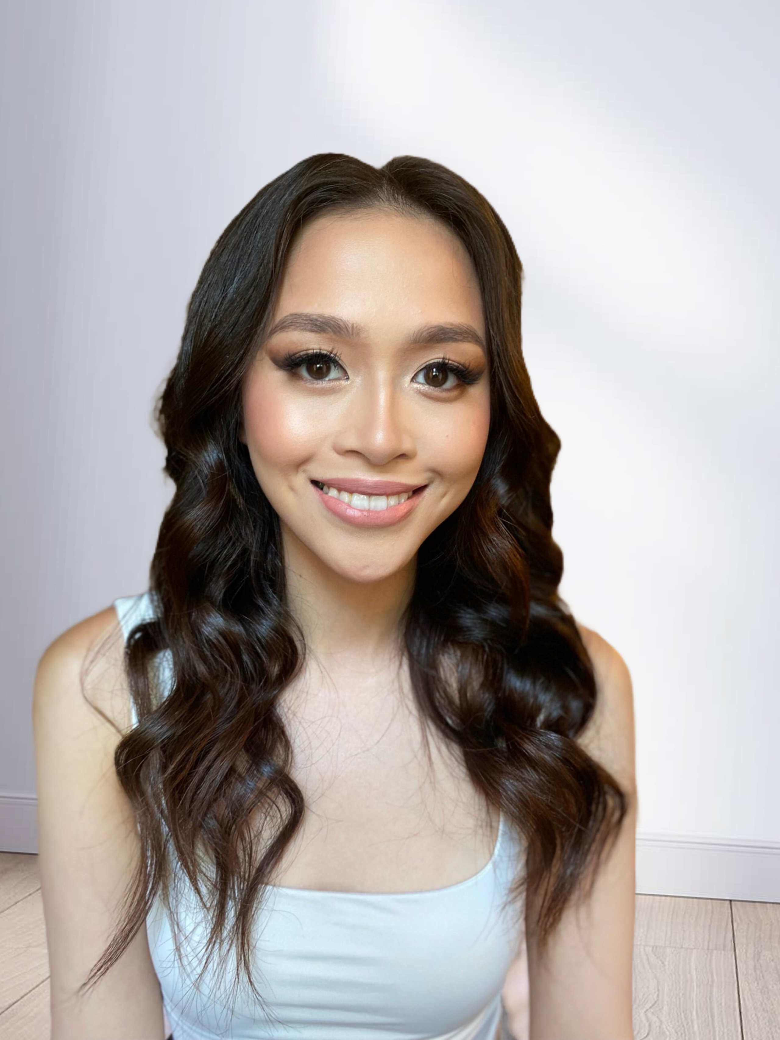 Filipina woman with stunning soft glam makeup done by a makeup artist from Russia