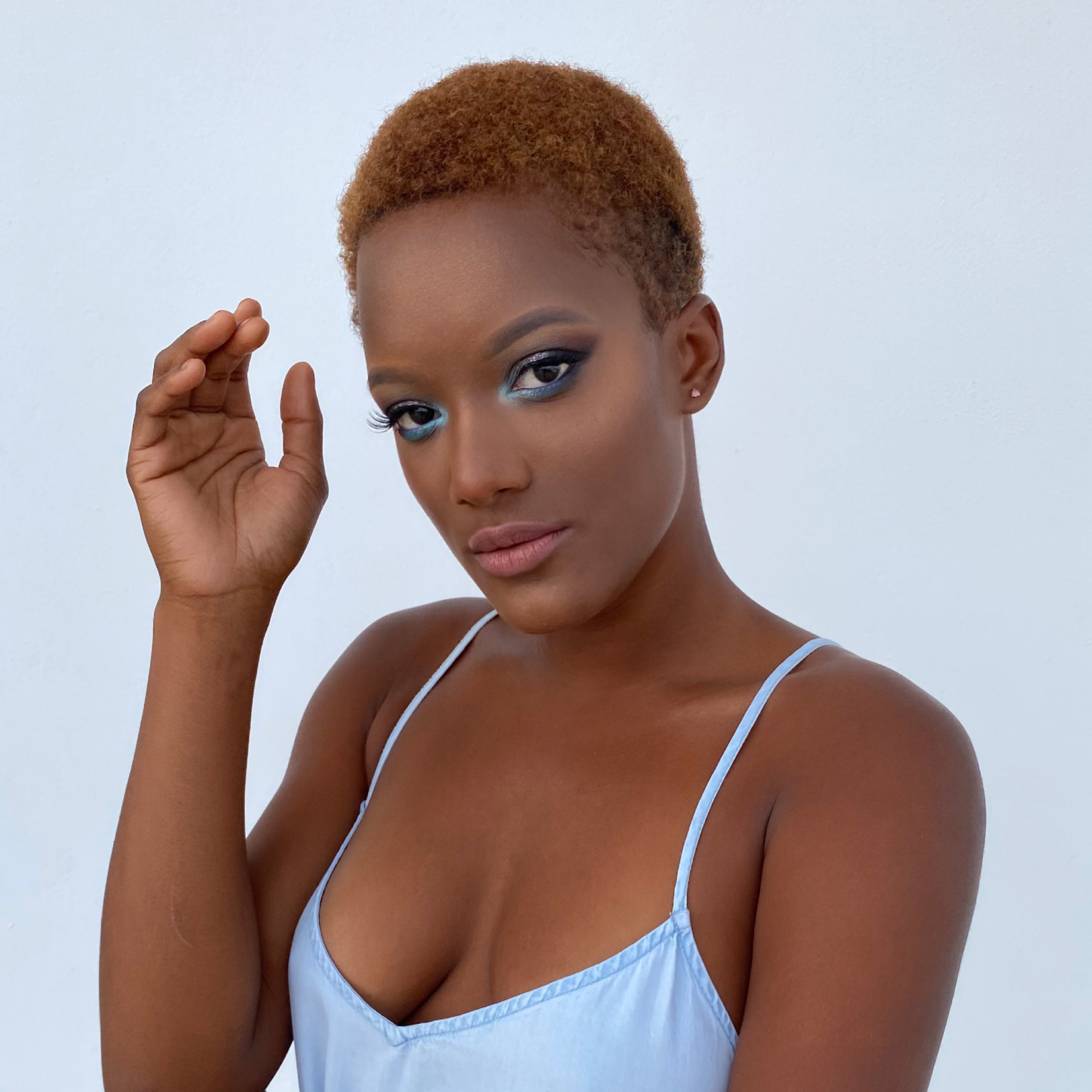 bold makeup looking cute with a blue accent on the eyes-Mexico-Playa del Carmen