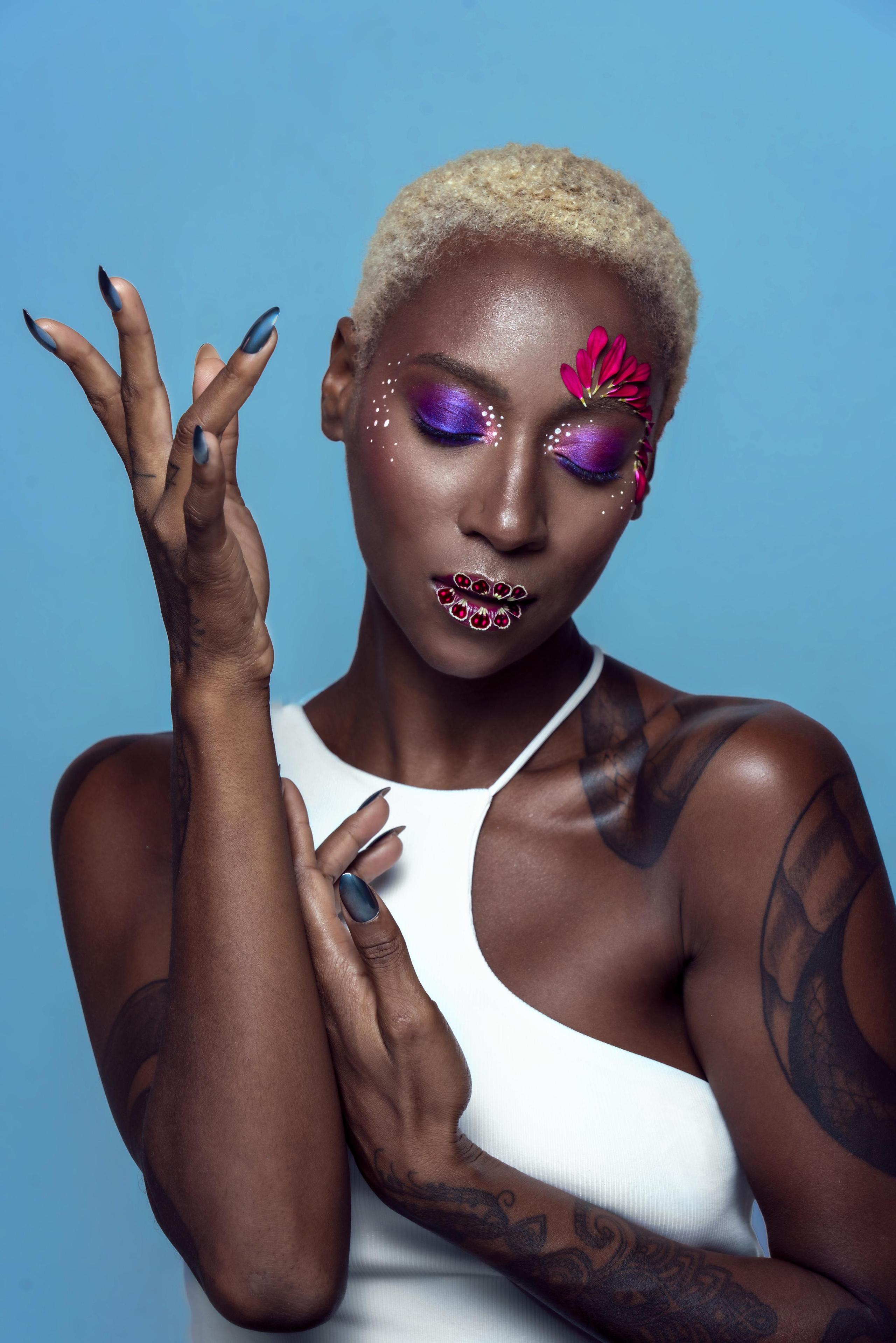artistic makeup with real flowers on the face-black woman-art photography
