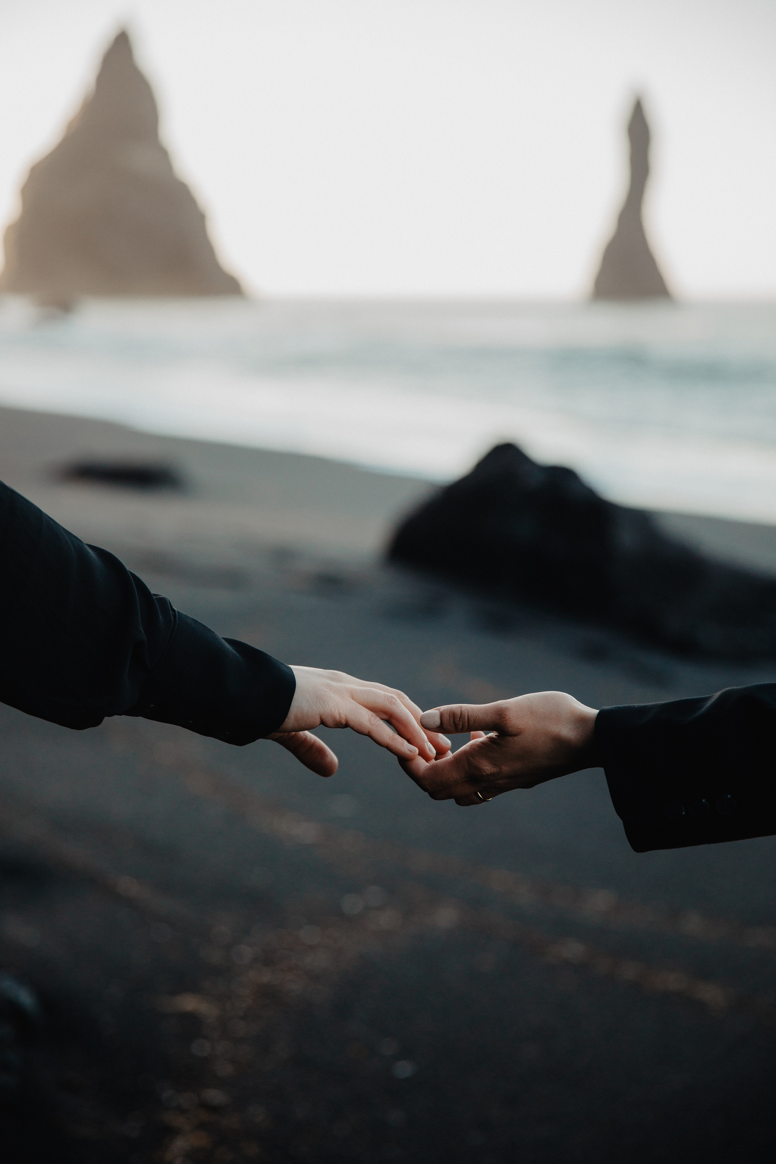 Sunrise elopement at black sand beach in Iceland. Iceland elopement photographer & videographer