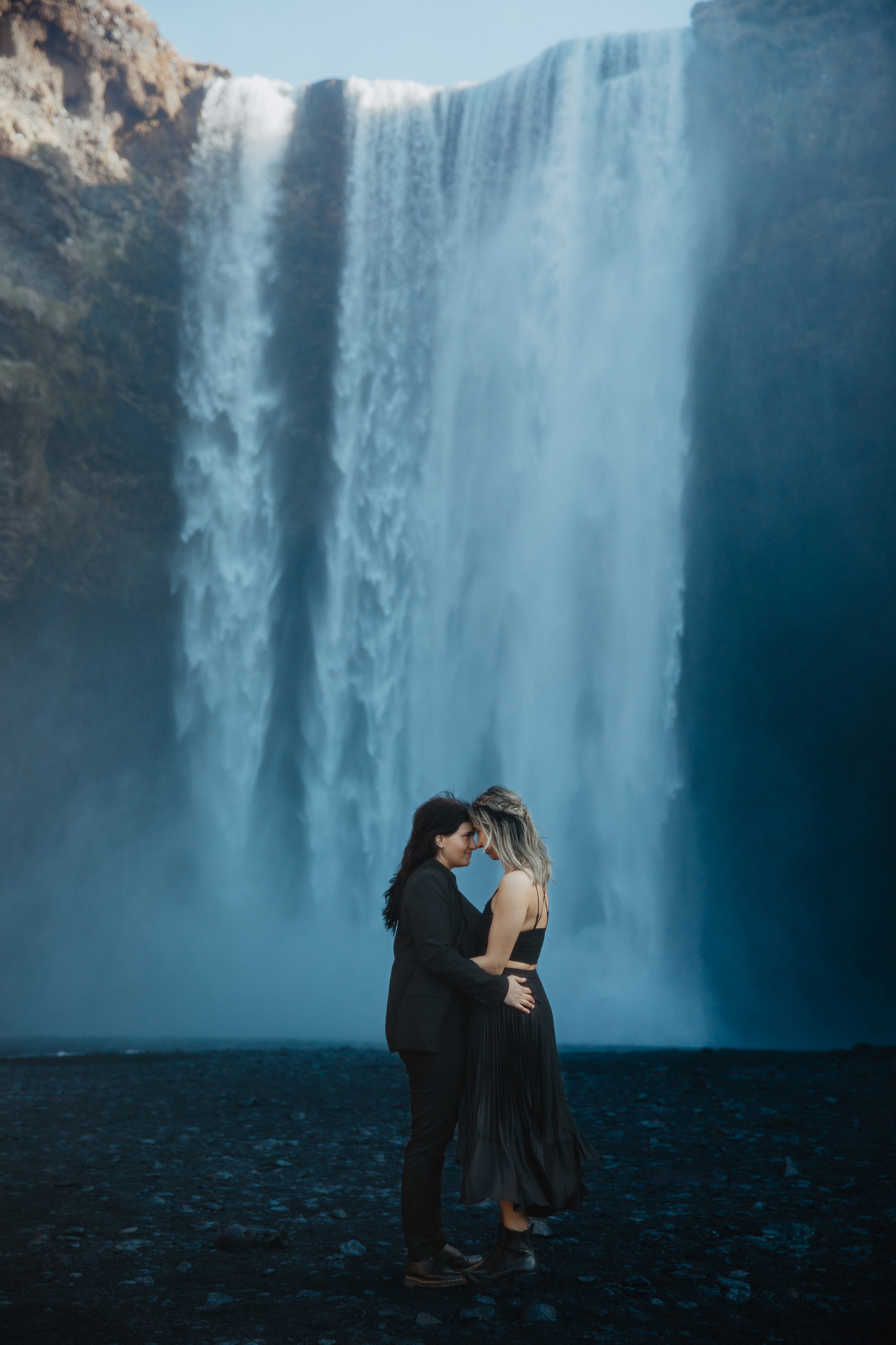 Sunrise elopement at black sand beach in Iceland. Iceland elopement photographer & videographer