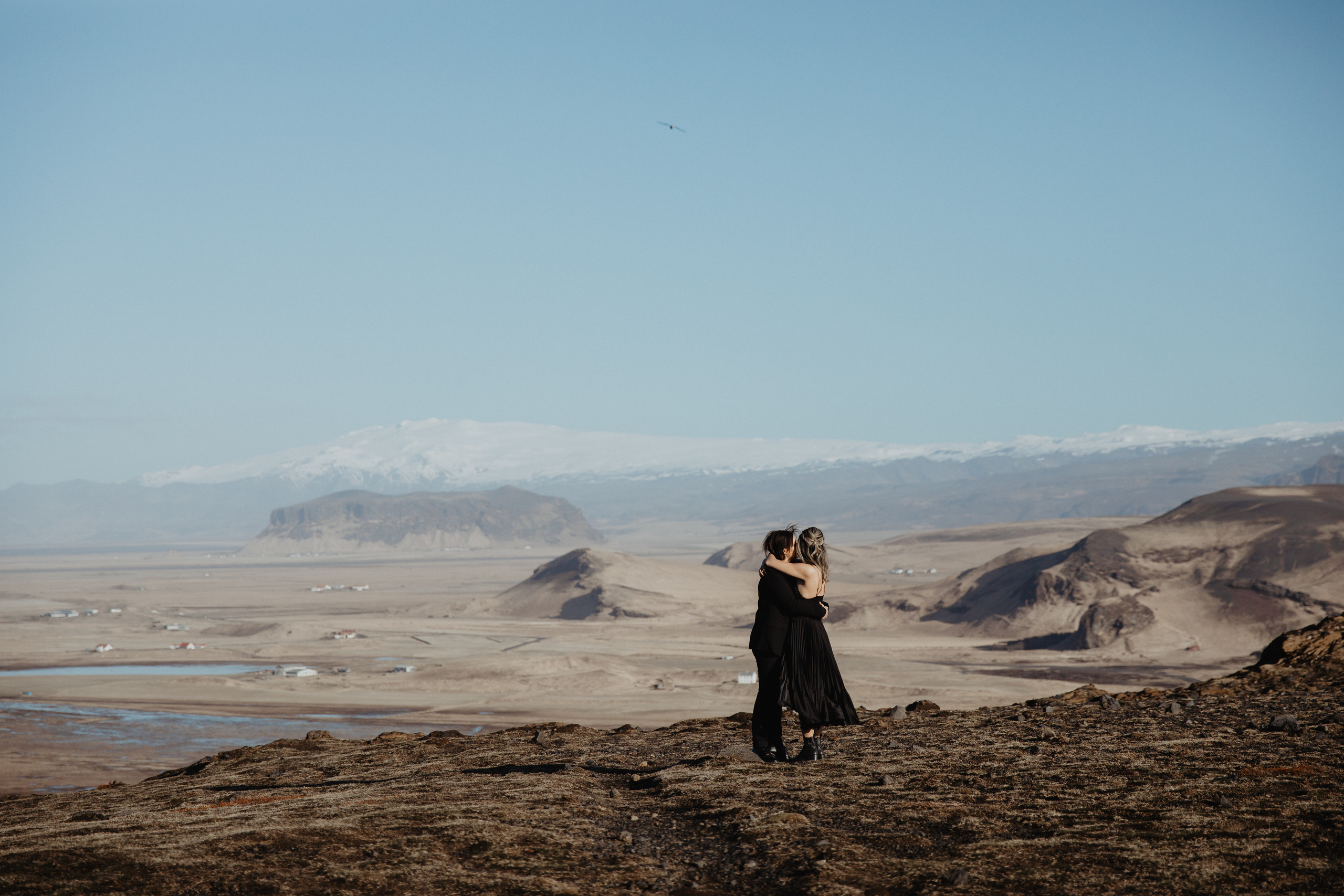 Sunrise elopement at black sand beach in Iceland. Iceland elopement photographer & videographer