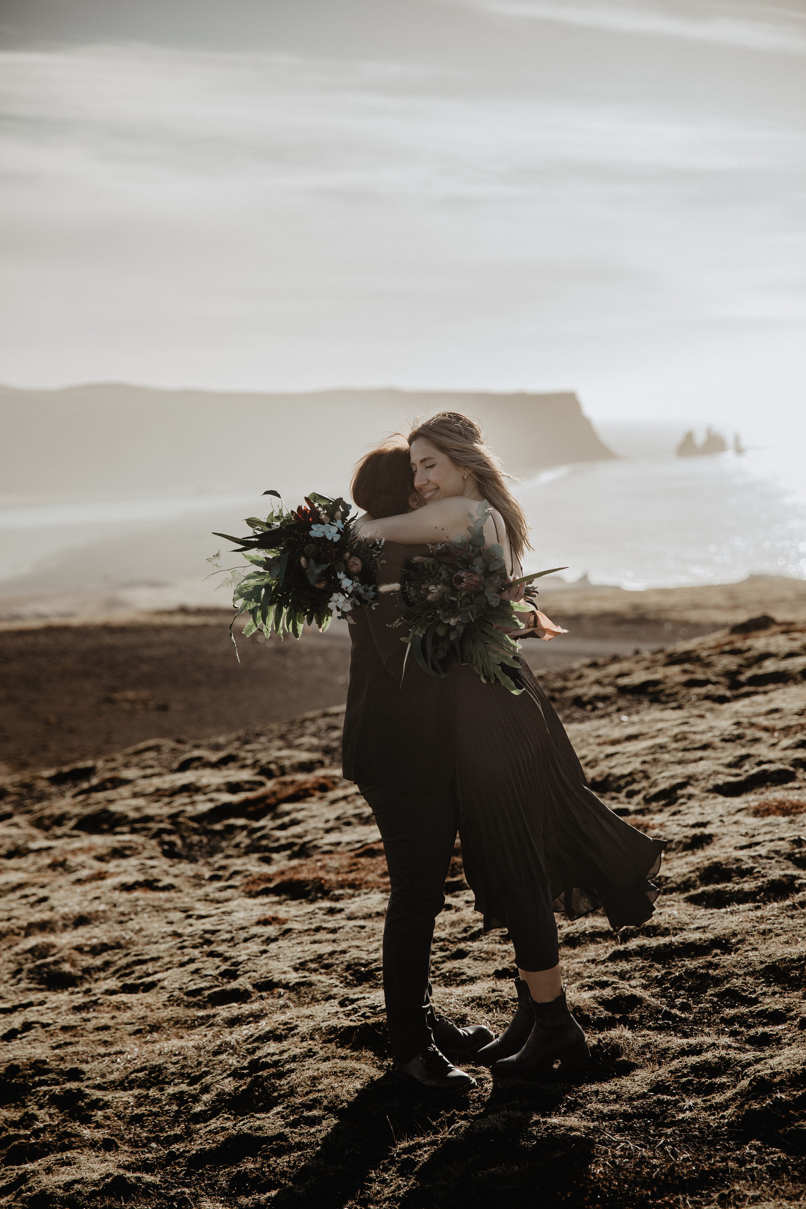 Sunrise elopement at black sand beach in Iceland. Iceland elopement photographer & videographer