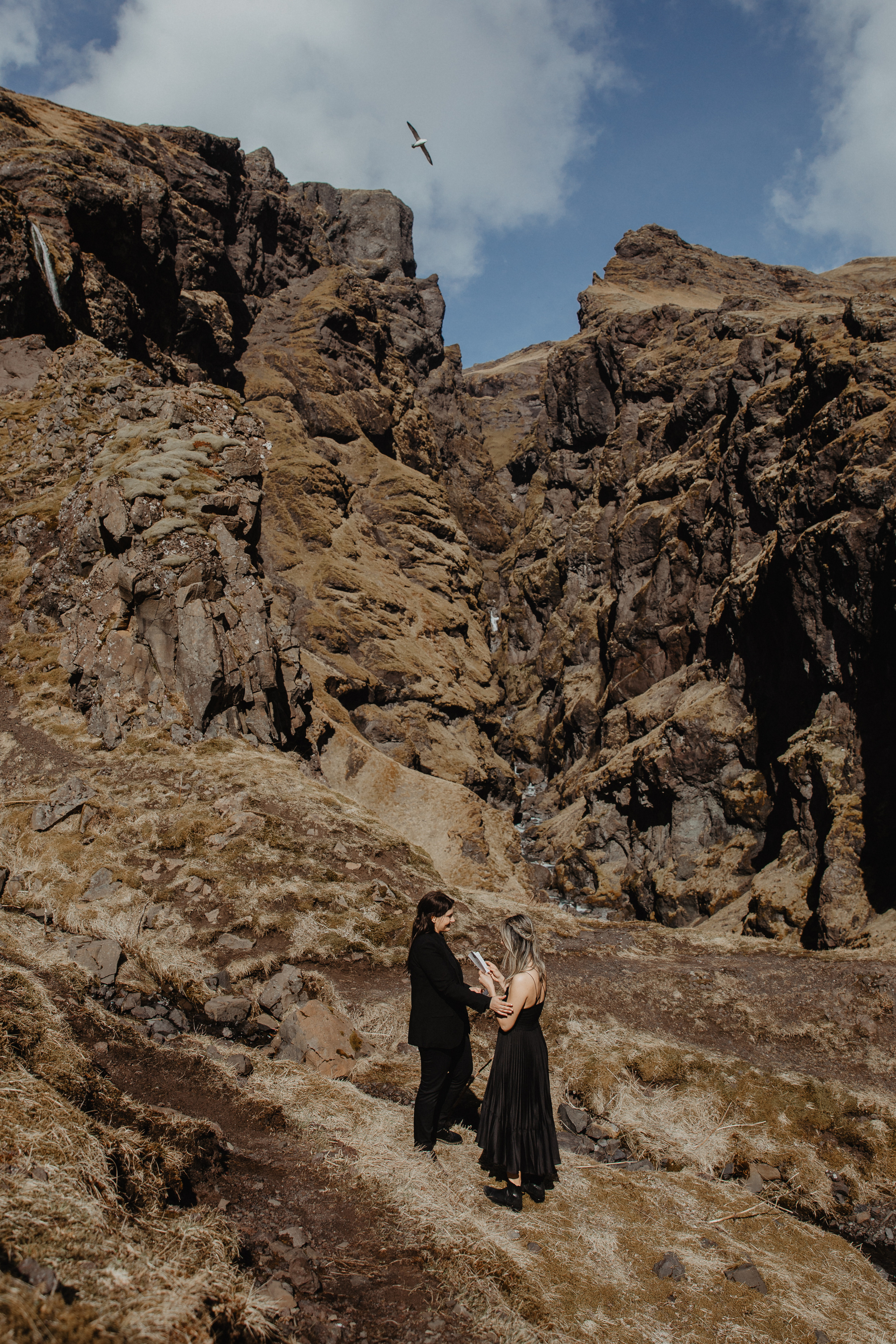Sunrise elopement at black sand beach in Iceland. Iceland elopement photographer & videographer