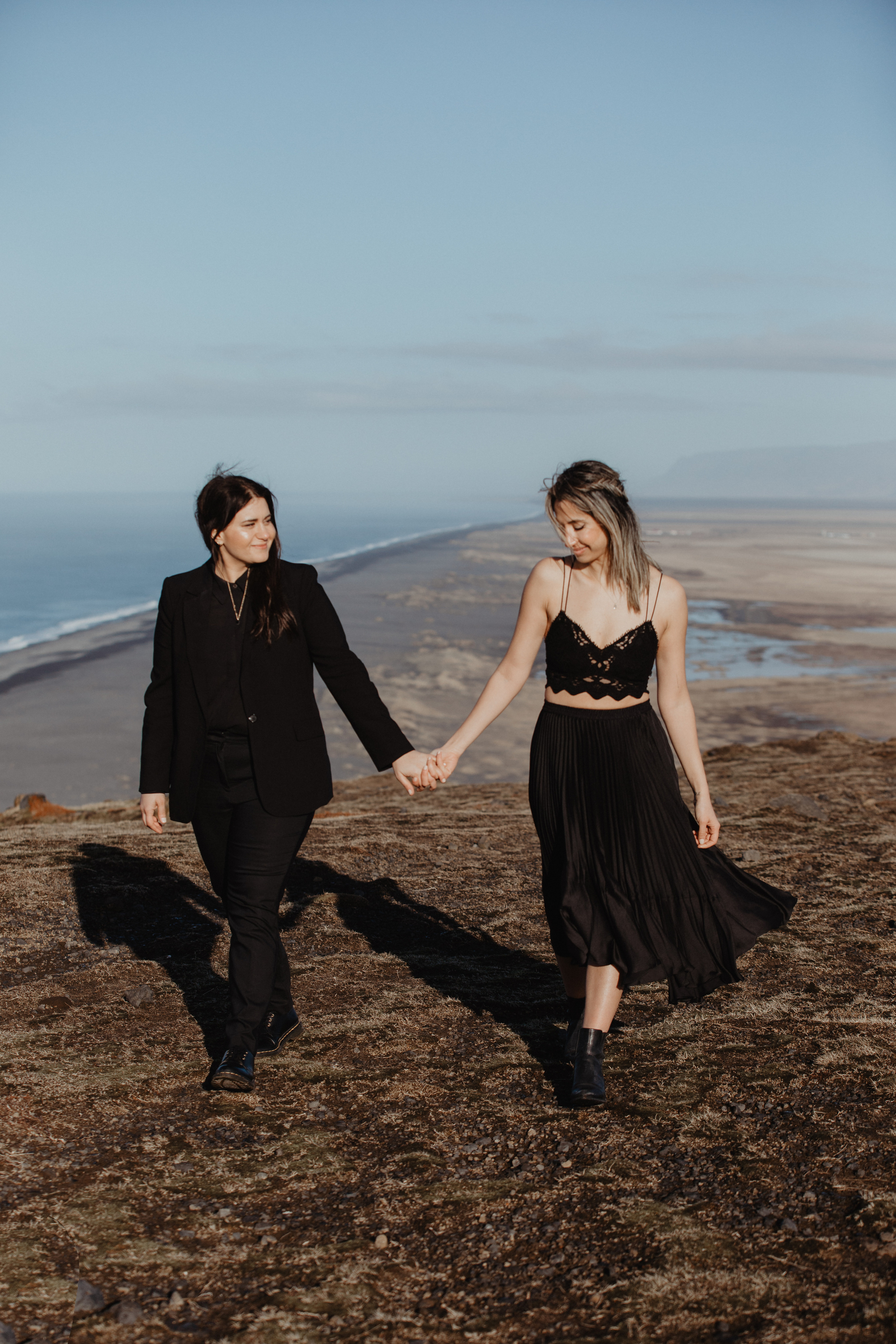 Sunrise elopement at black sand beach in Iceland. Iceland elopement photographer & videographer