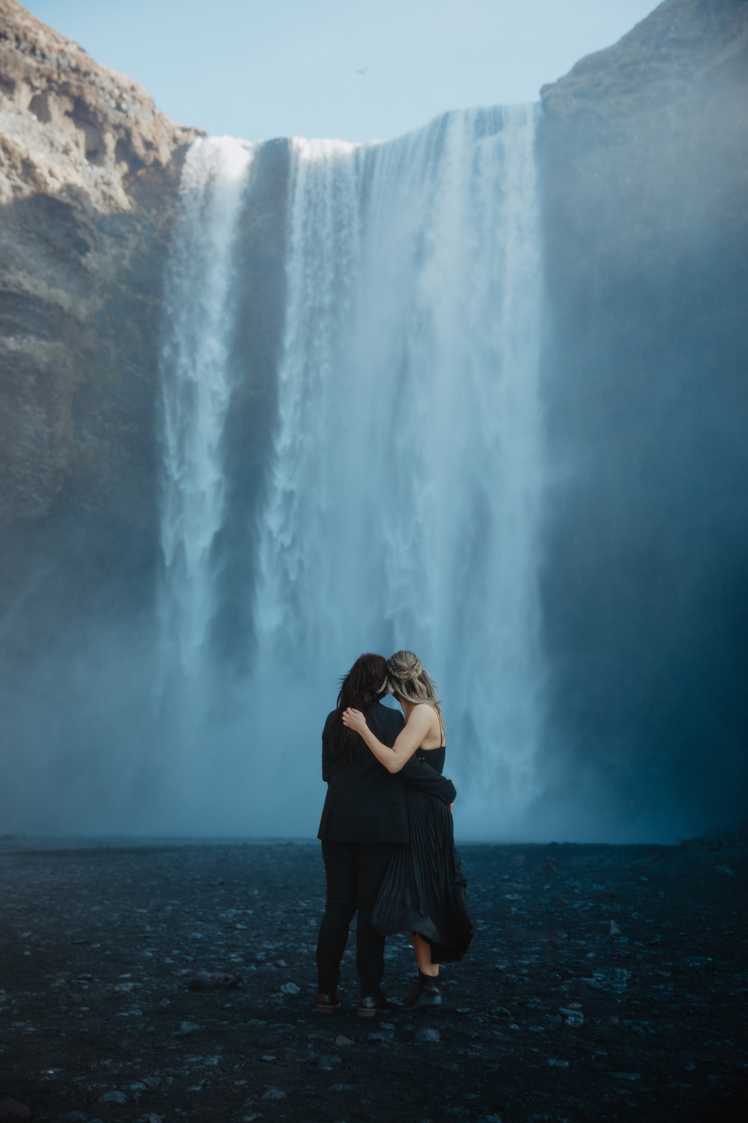 Sunrise elopement at black sand beach in Iceland. Iceland elopement photographer & videographer