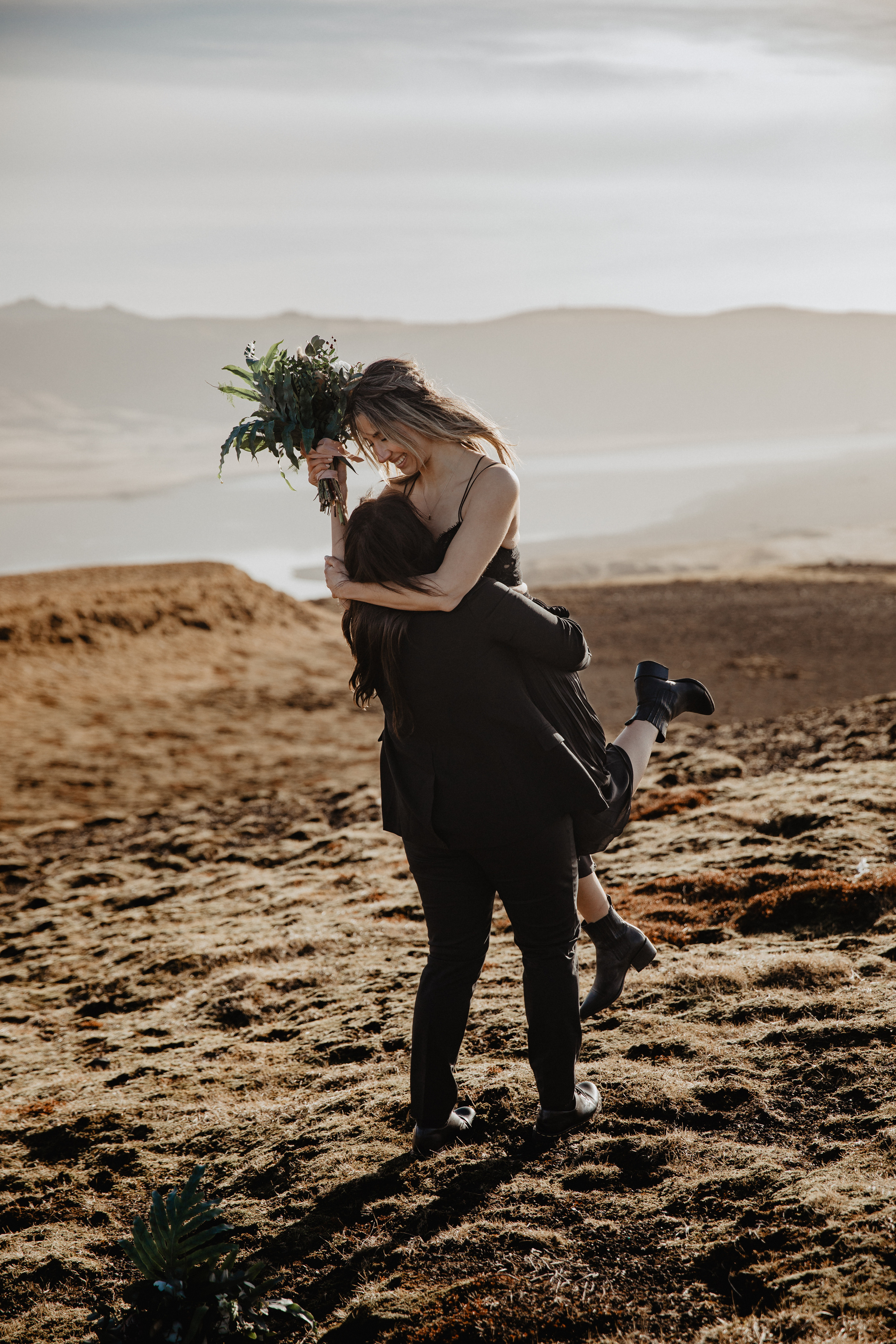 Sunrise elopement at black sand beach in Iceland. Iceland elopement photographer & videographer