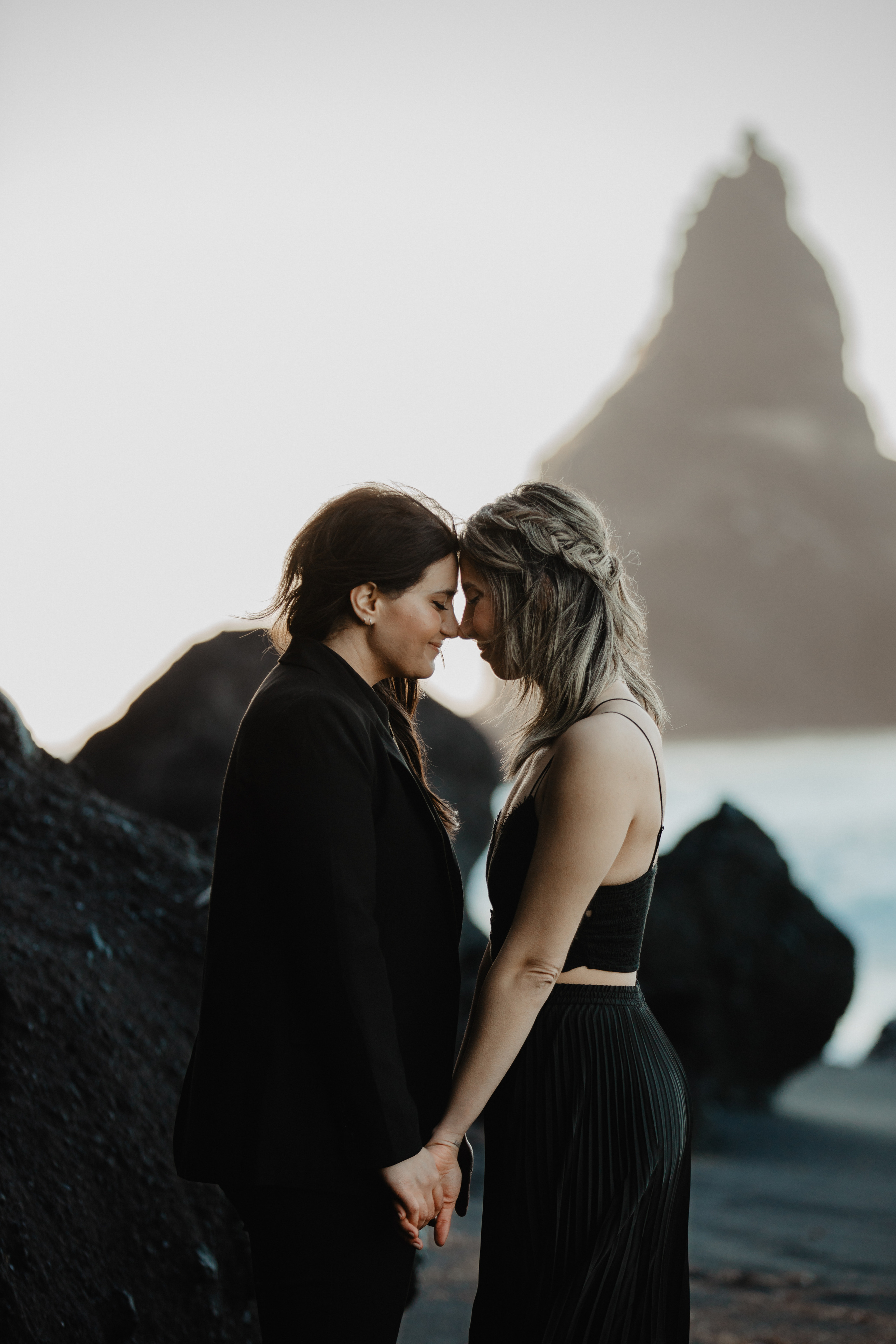 Sunrise elopement at black sand beach in Iceland. Iceland elopement photographer & videographer
