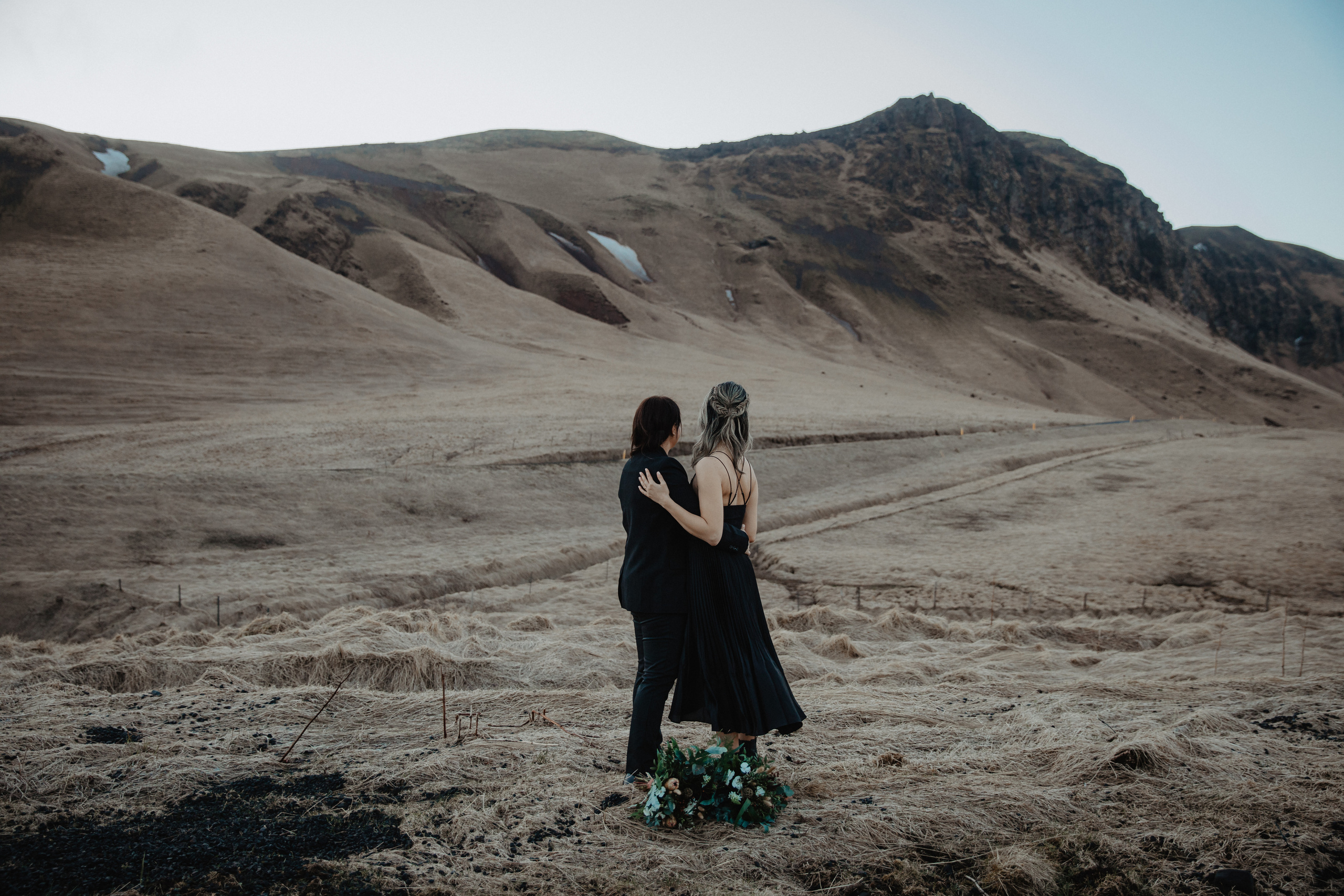 Sunrise elopement at black sand beach in Iceland. Iceland elopement photographer & videographer