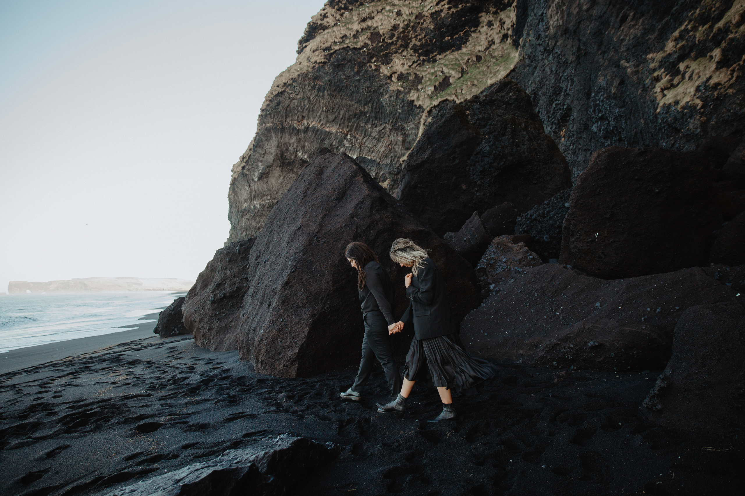 Sunrise elopement at black sand beach in Iceland. Iceland elopement photographer & videographer