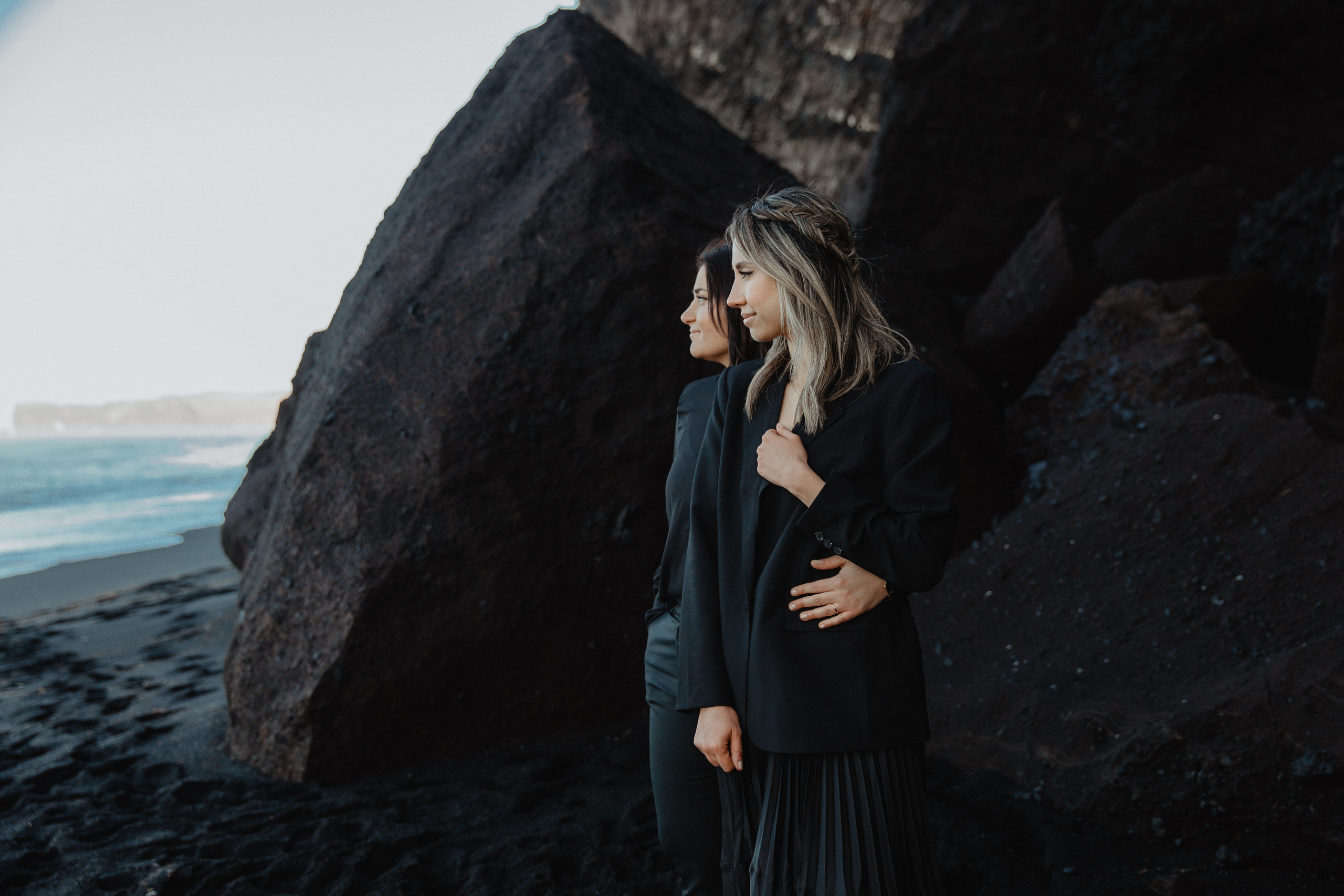 Sunrise elopement at black sand beach in Iceland. Iceland elopement photographer & videographer
