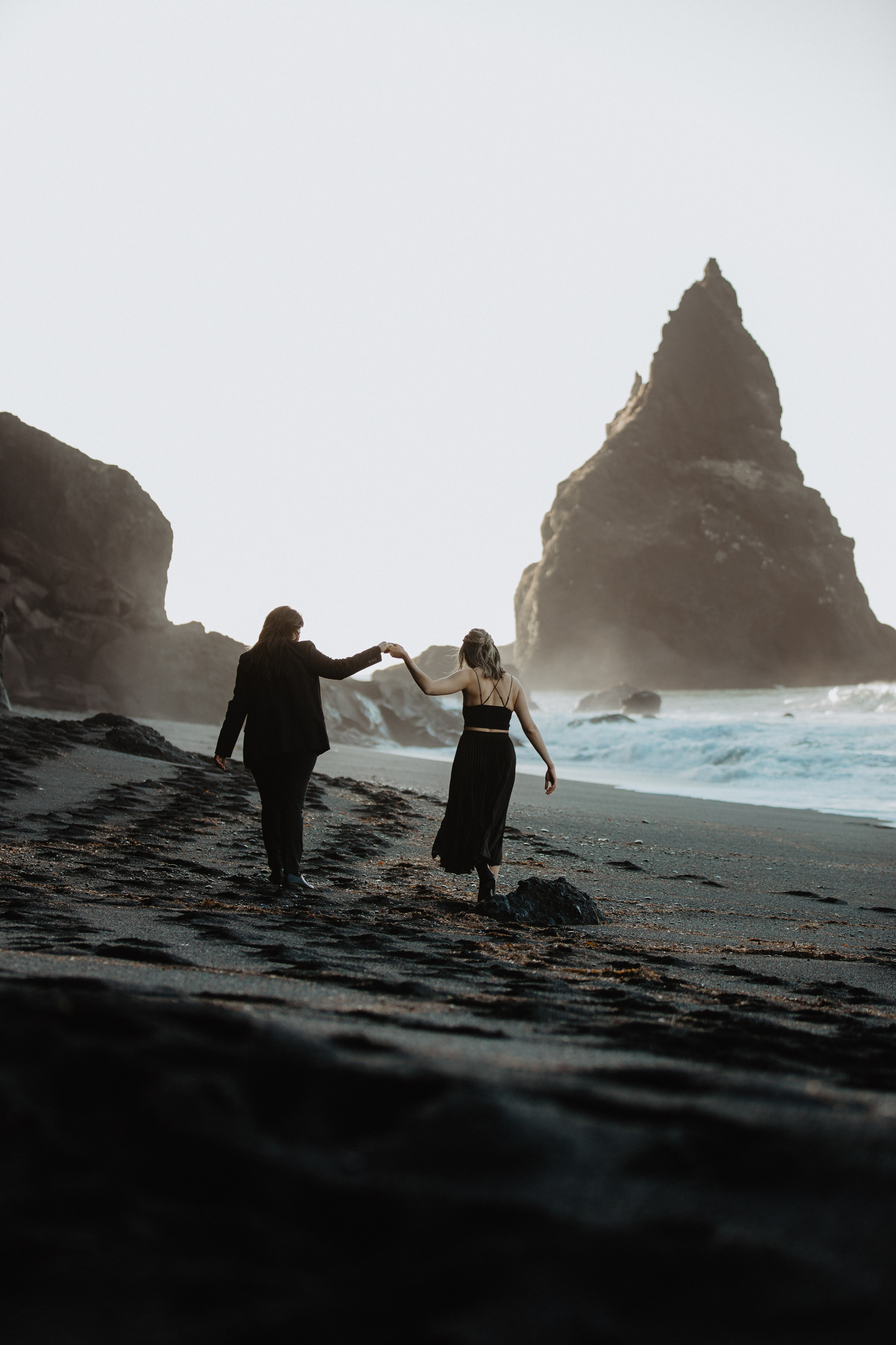 Sunrise elopement at black sand beach in Iceland. Iceland elopement photographer & videographer