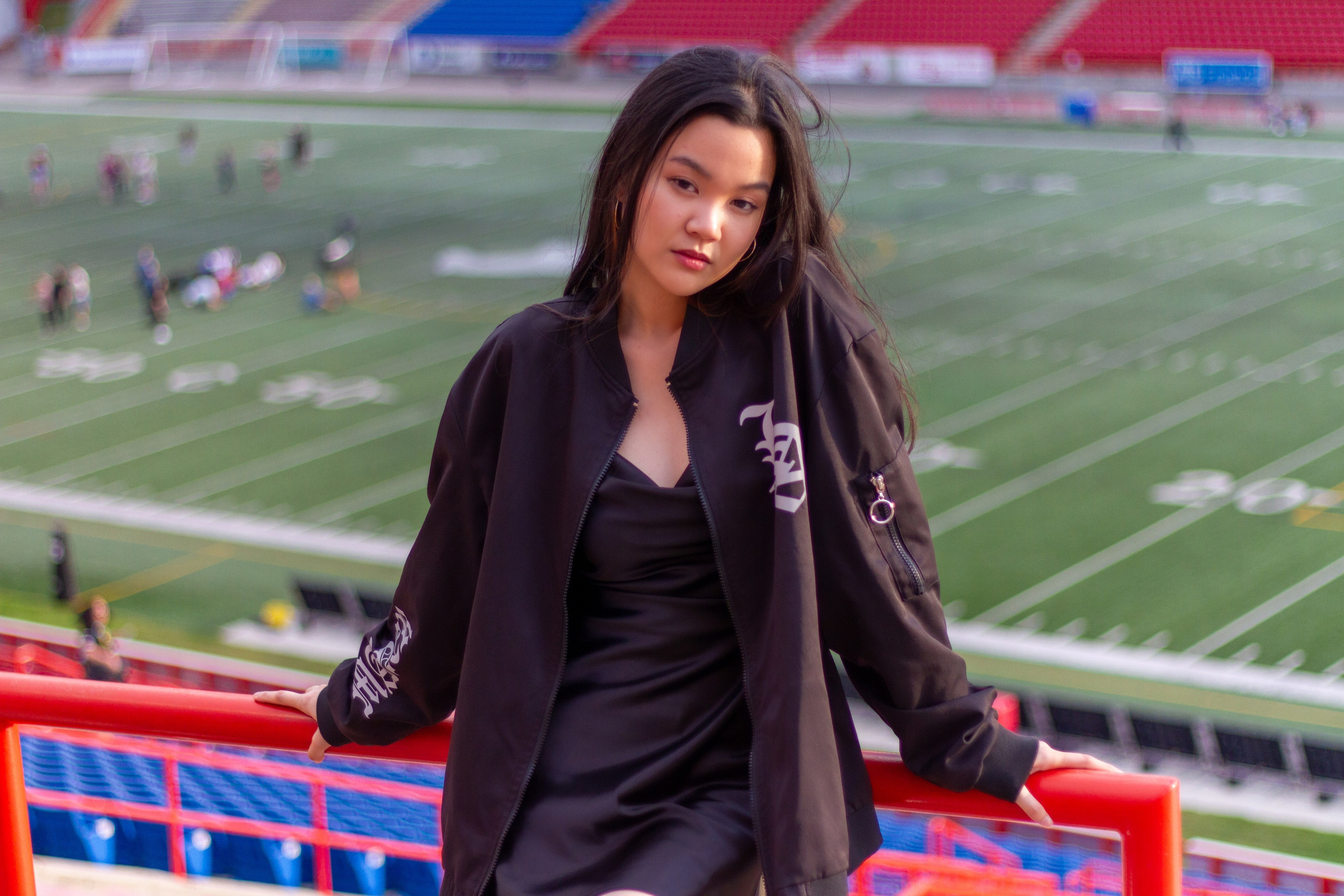 Model Ann at McMahon Stadium: A Stunning Photoshoot Under the Stadium Lights. ProFly.club — Professional aerial filming in Calgary
