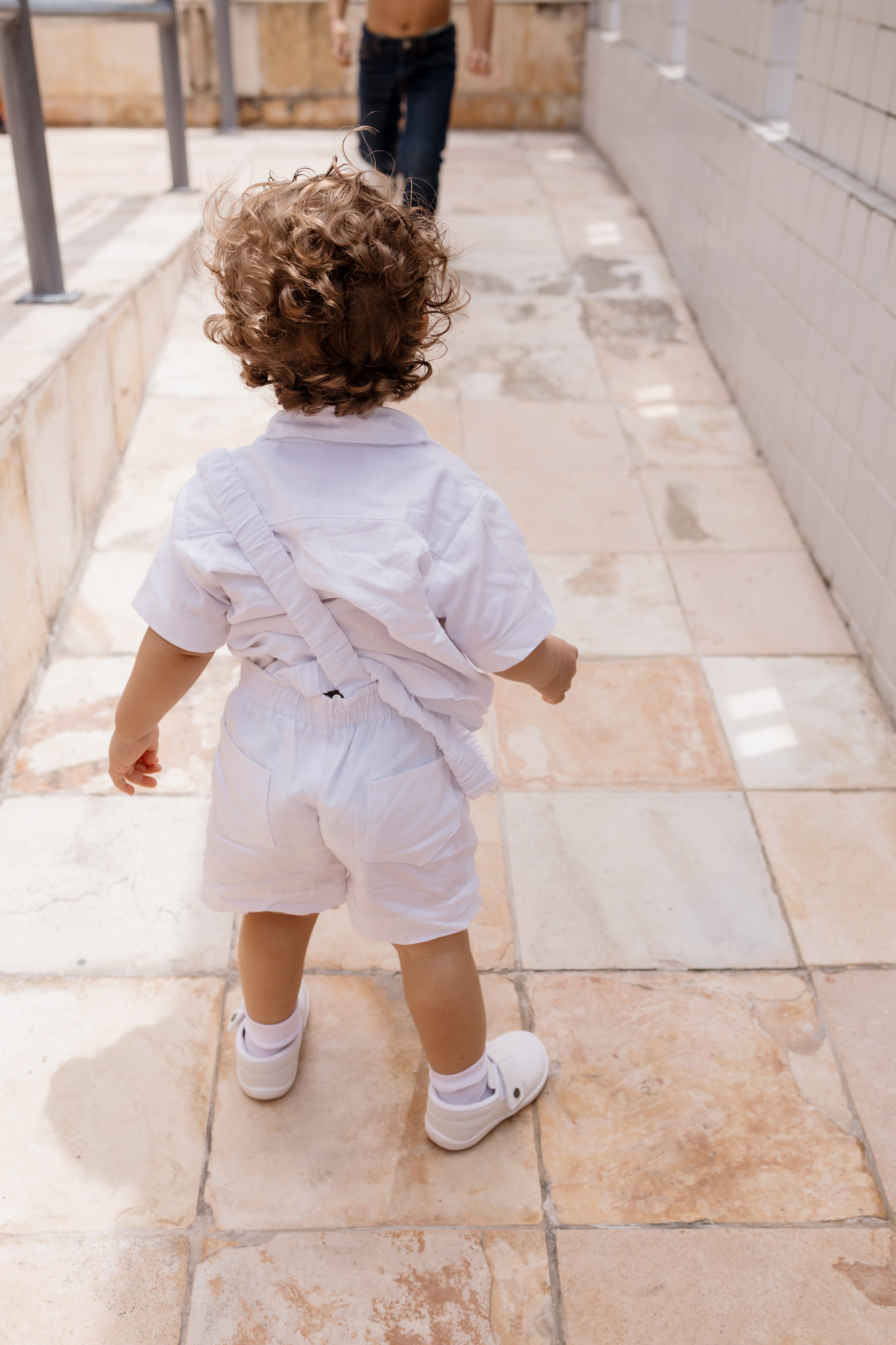 Crianças brincando durante a confraternização após o batizado