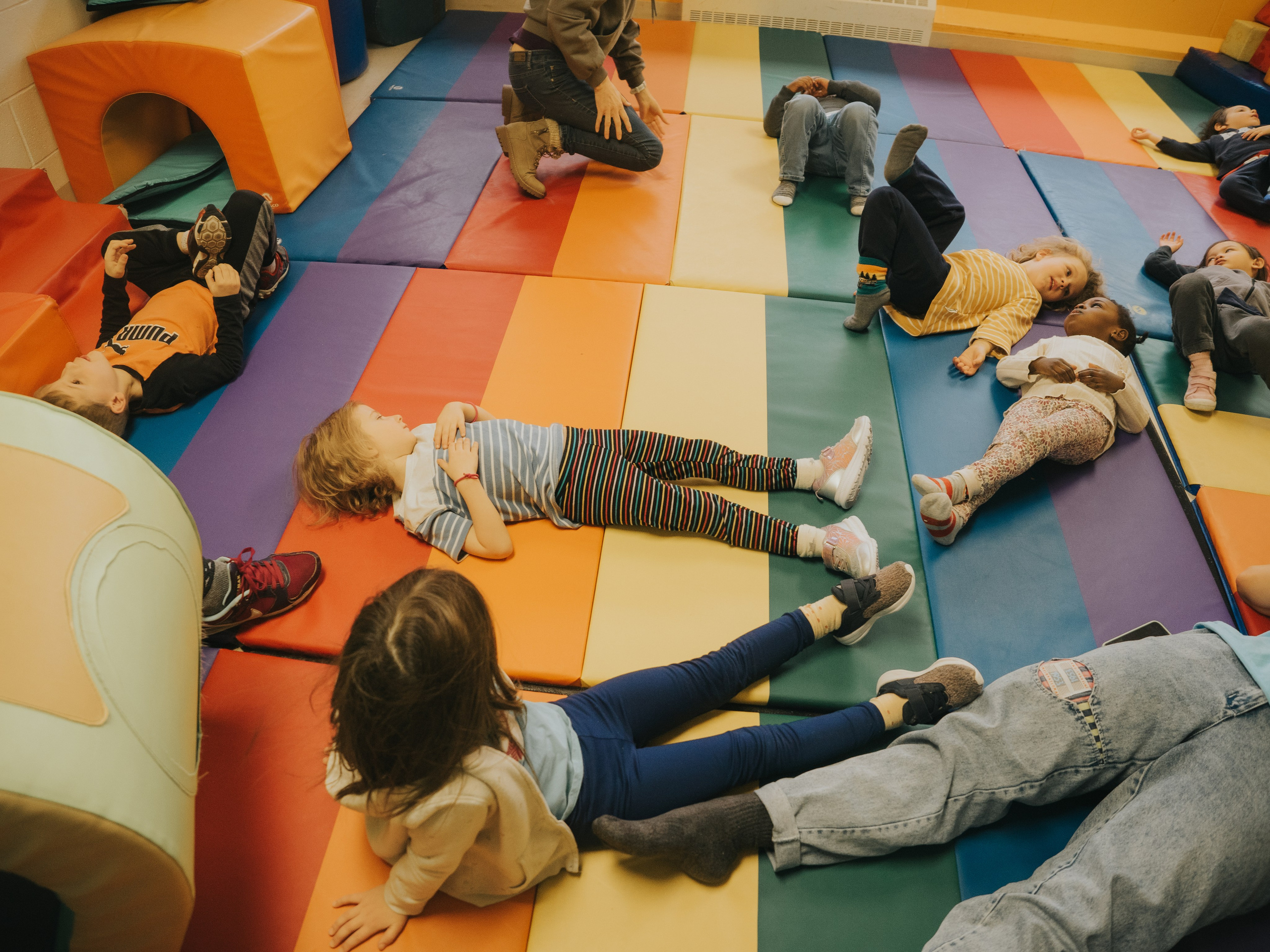 Children calming down after a dance session.