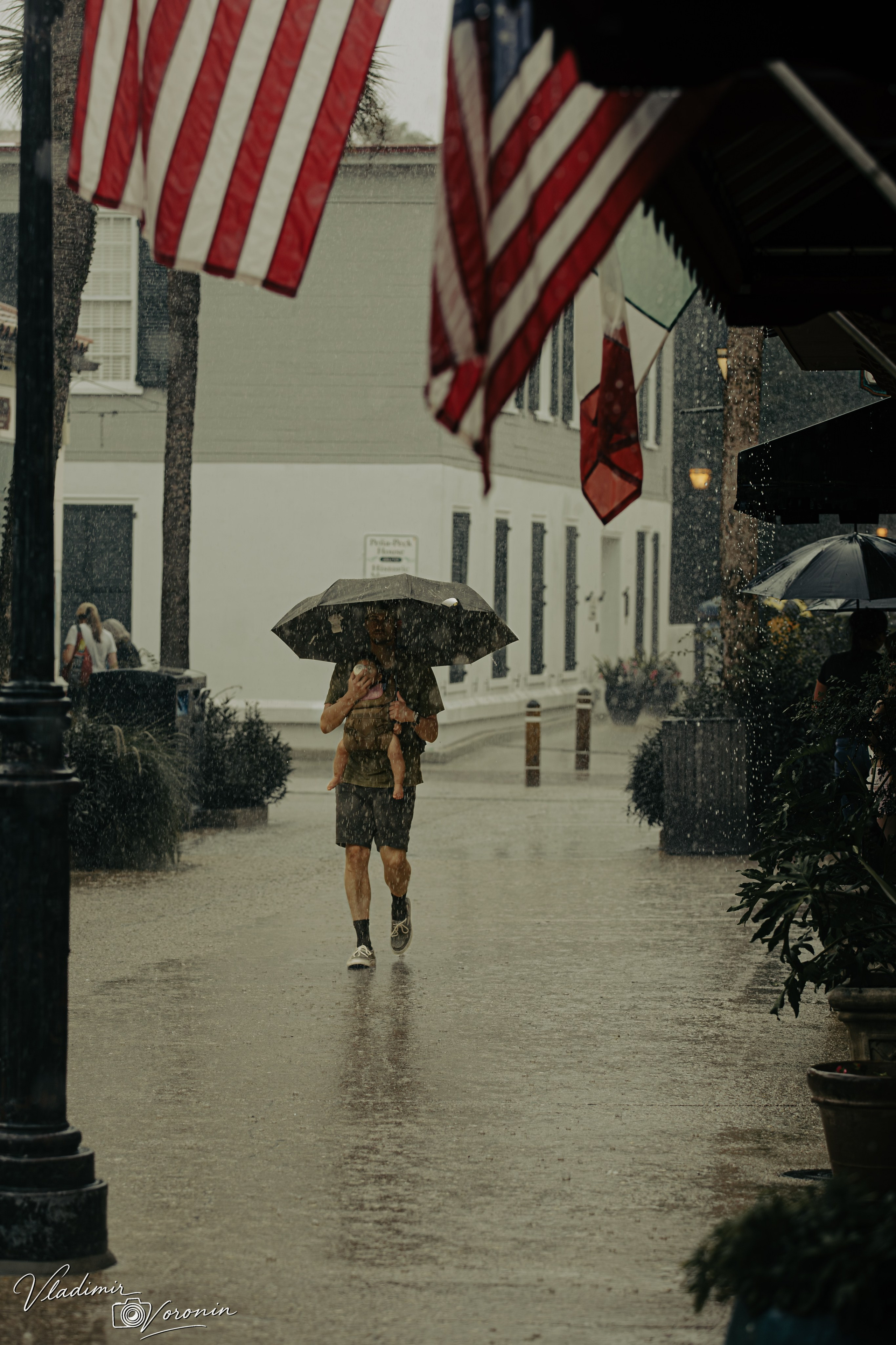 Rain in downtown. Photographer St. Augustine