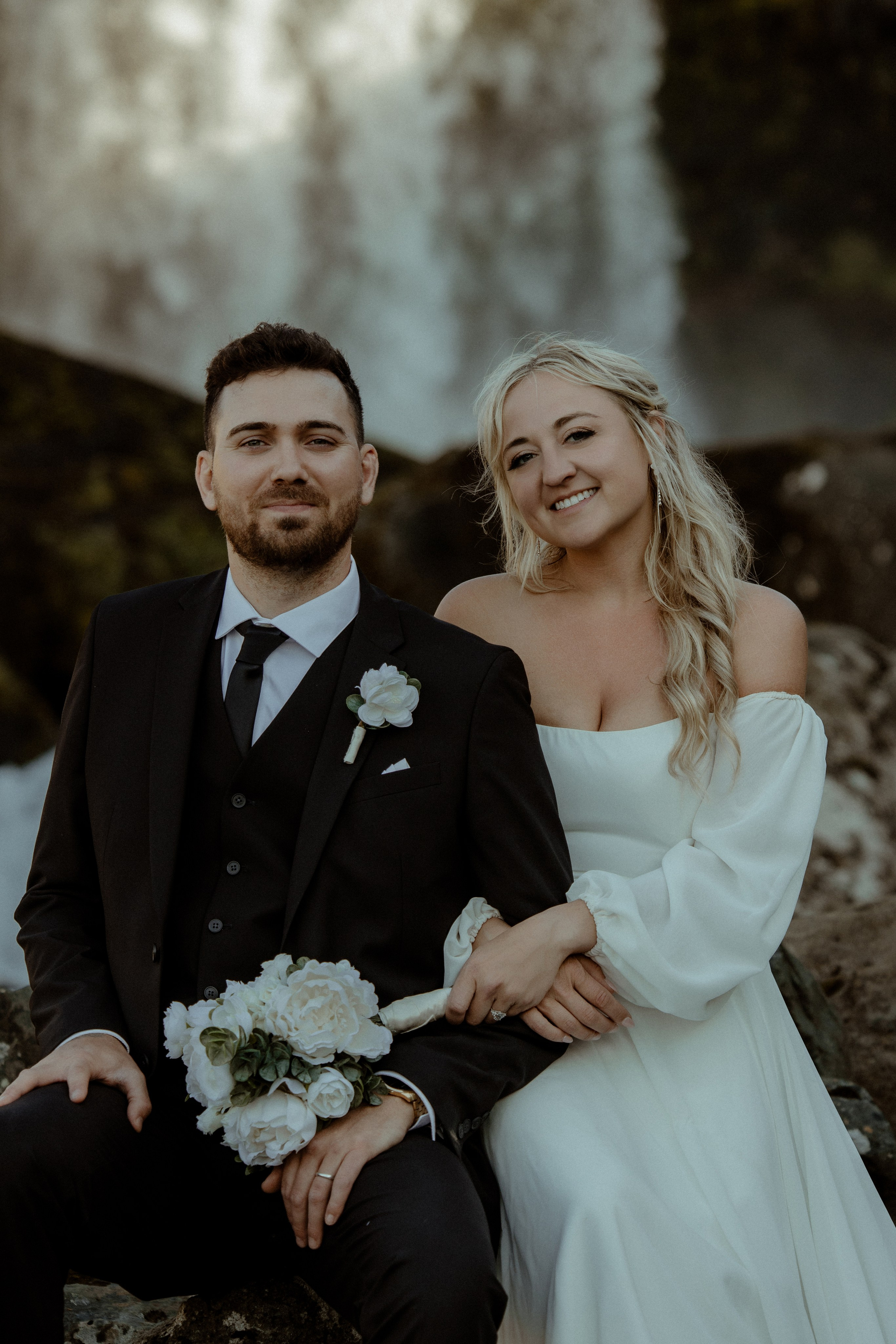 Iceland elopement at Budir with midnight sun wedding photos at black sand beach. Iceland elopement photographer & videographer