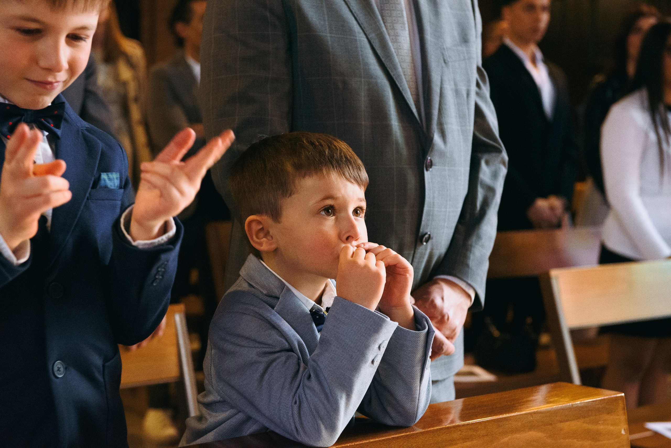 Baptism of a child in Milan with a photographer