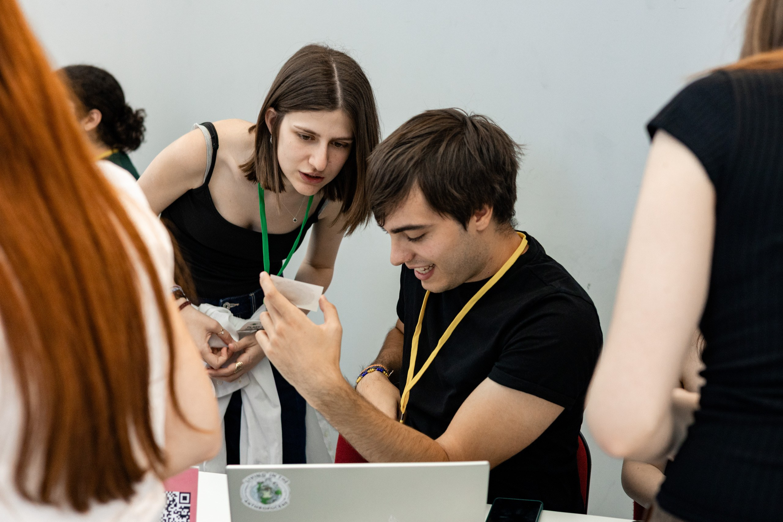 Conference participants networking during a break