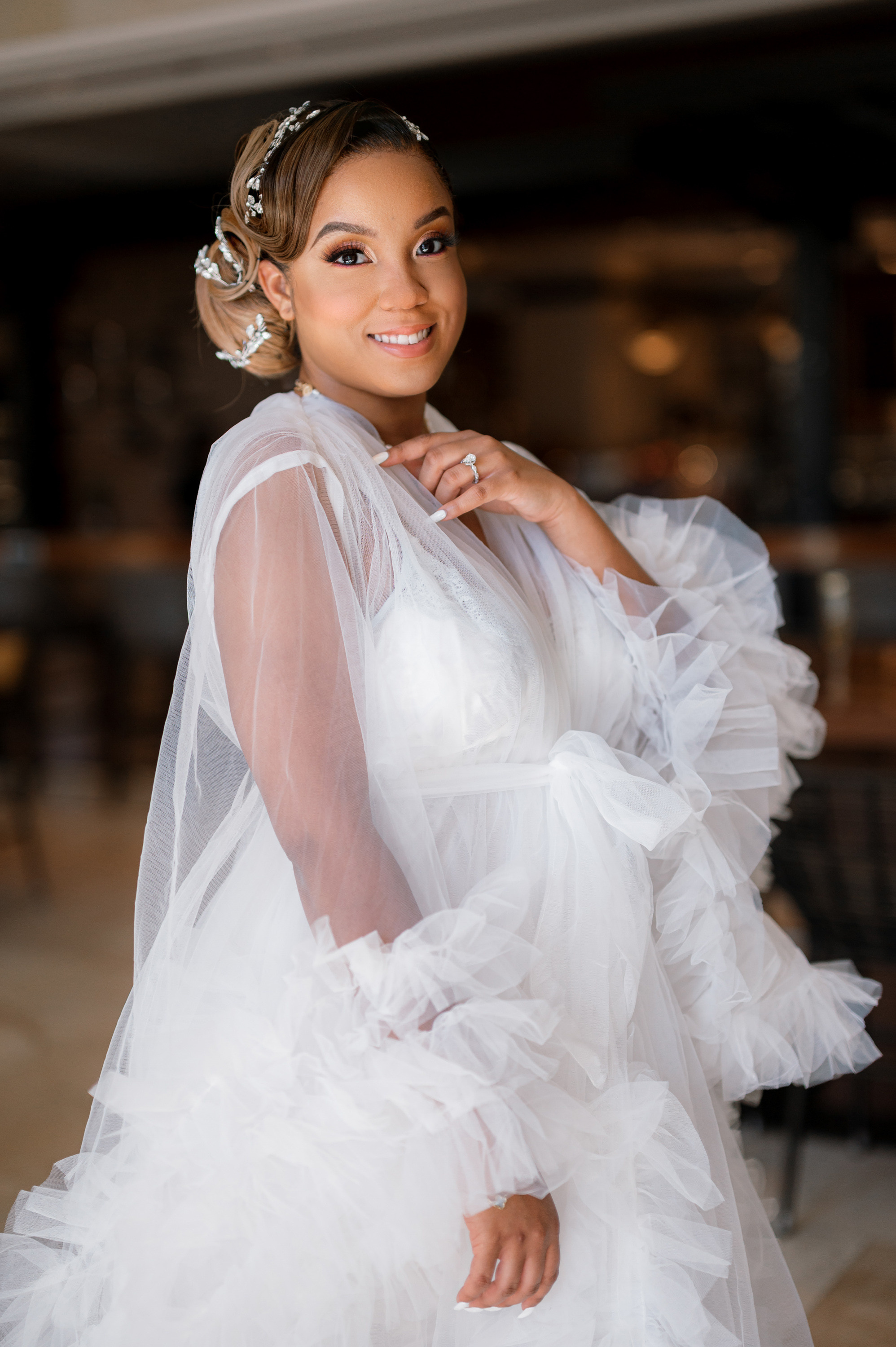 a woman in a white dress and veil