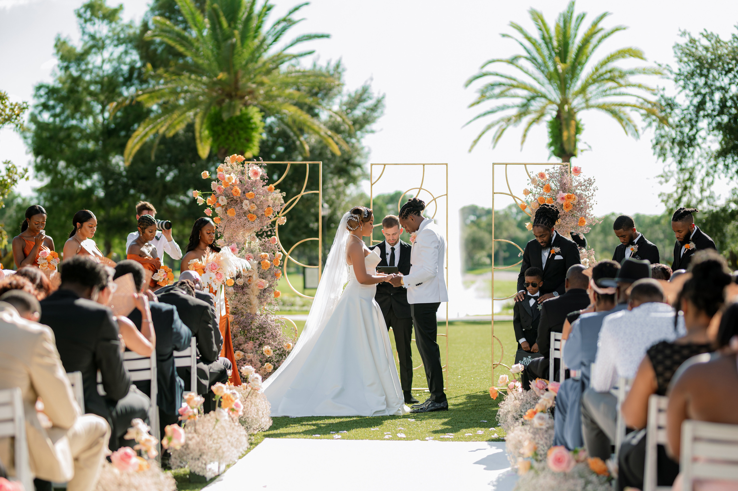 a couple is married in front of a wedding ceremony