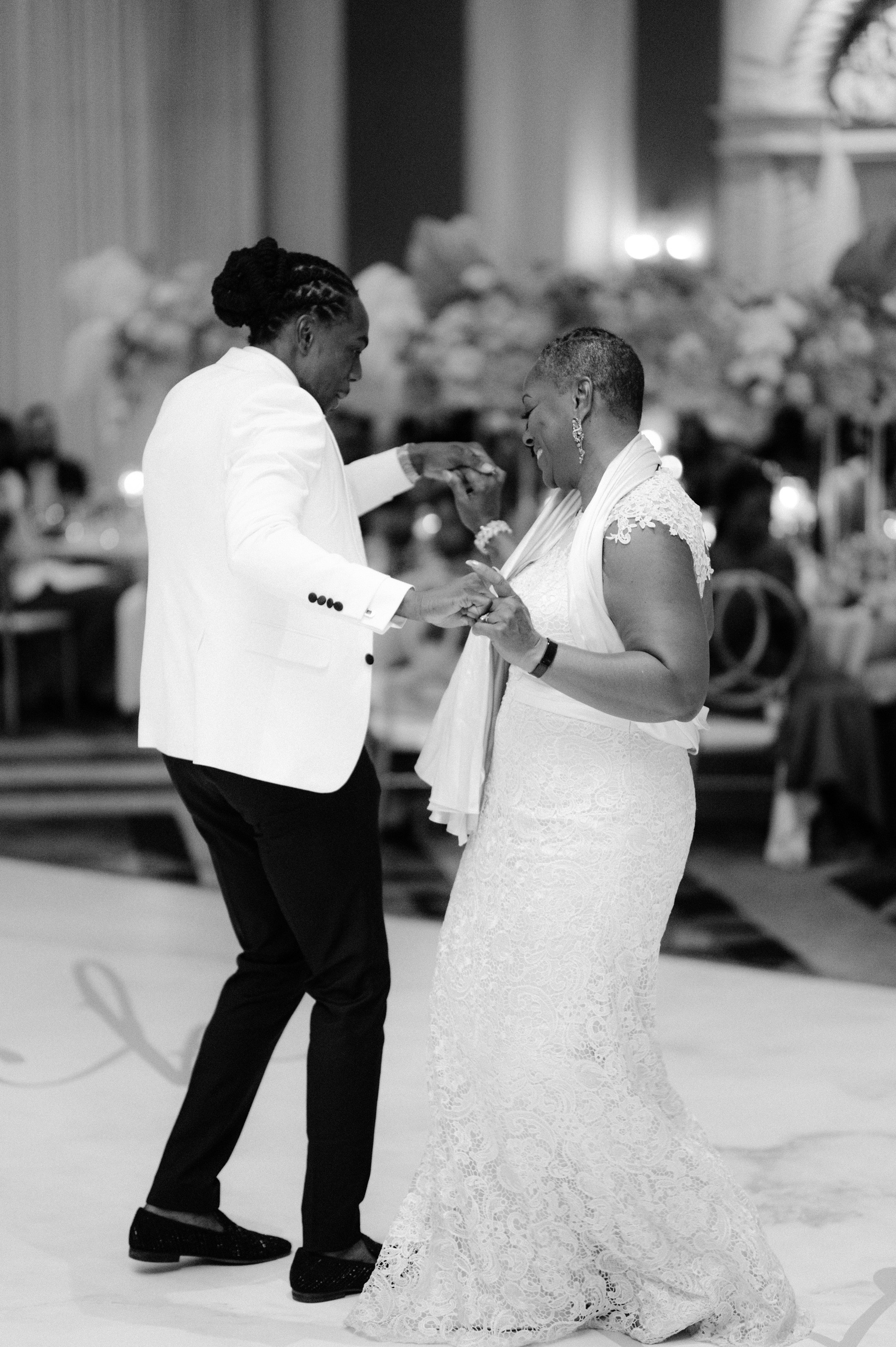 a bride and groom dancing at their wedding