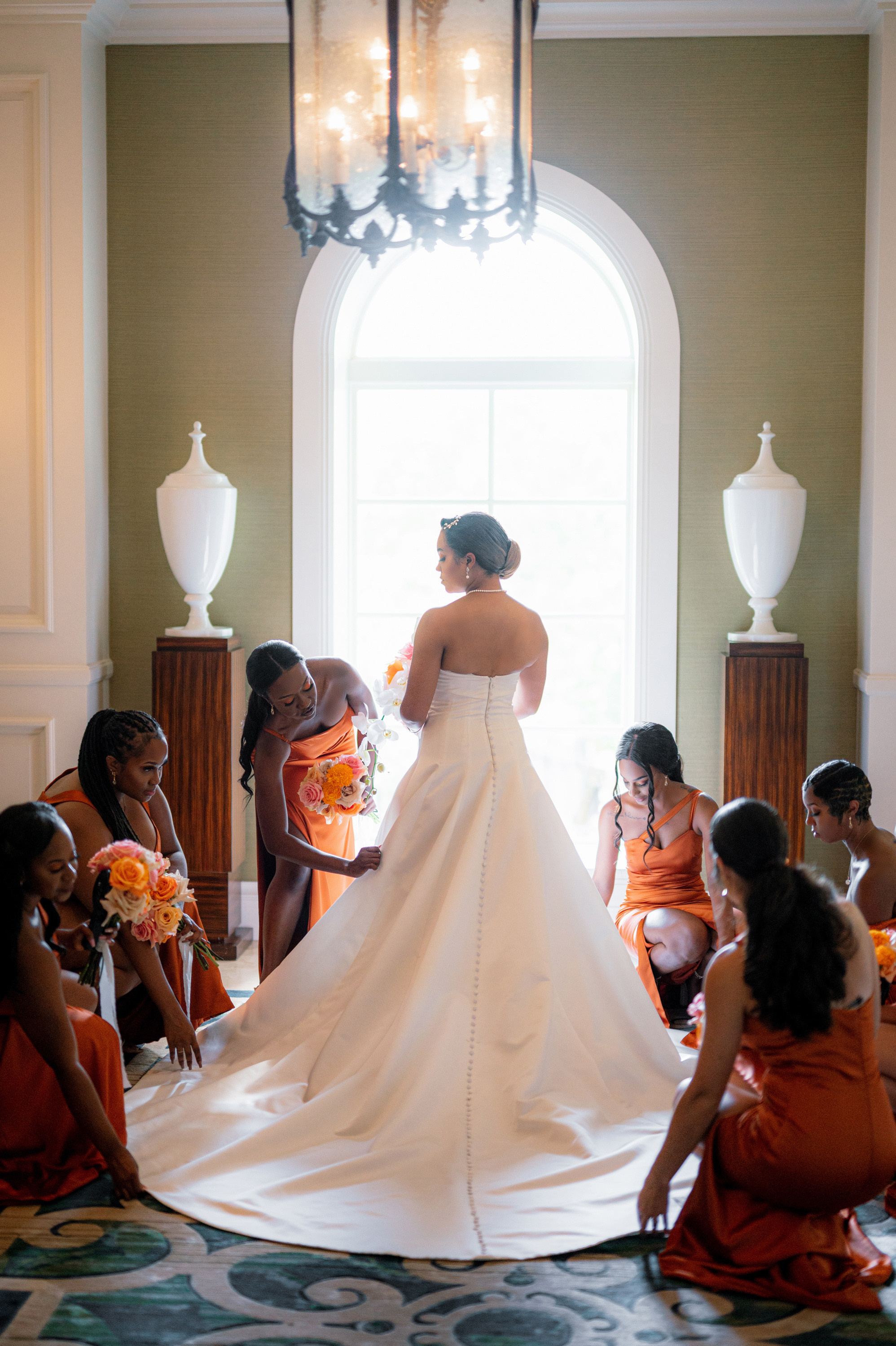 a bride is getting ready to walk down the aisle