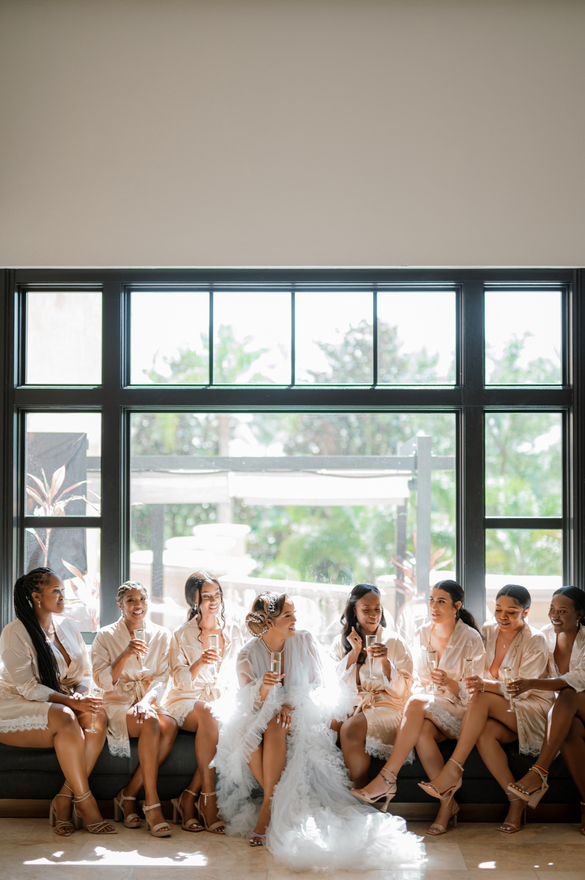 a group of women sitting on a couch