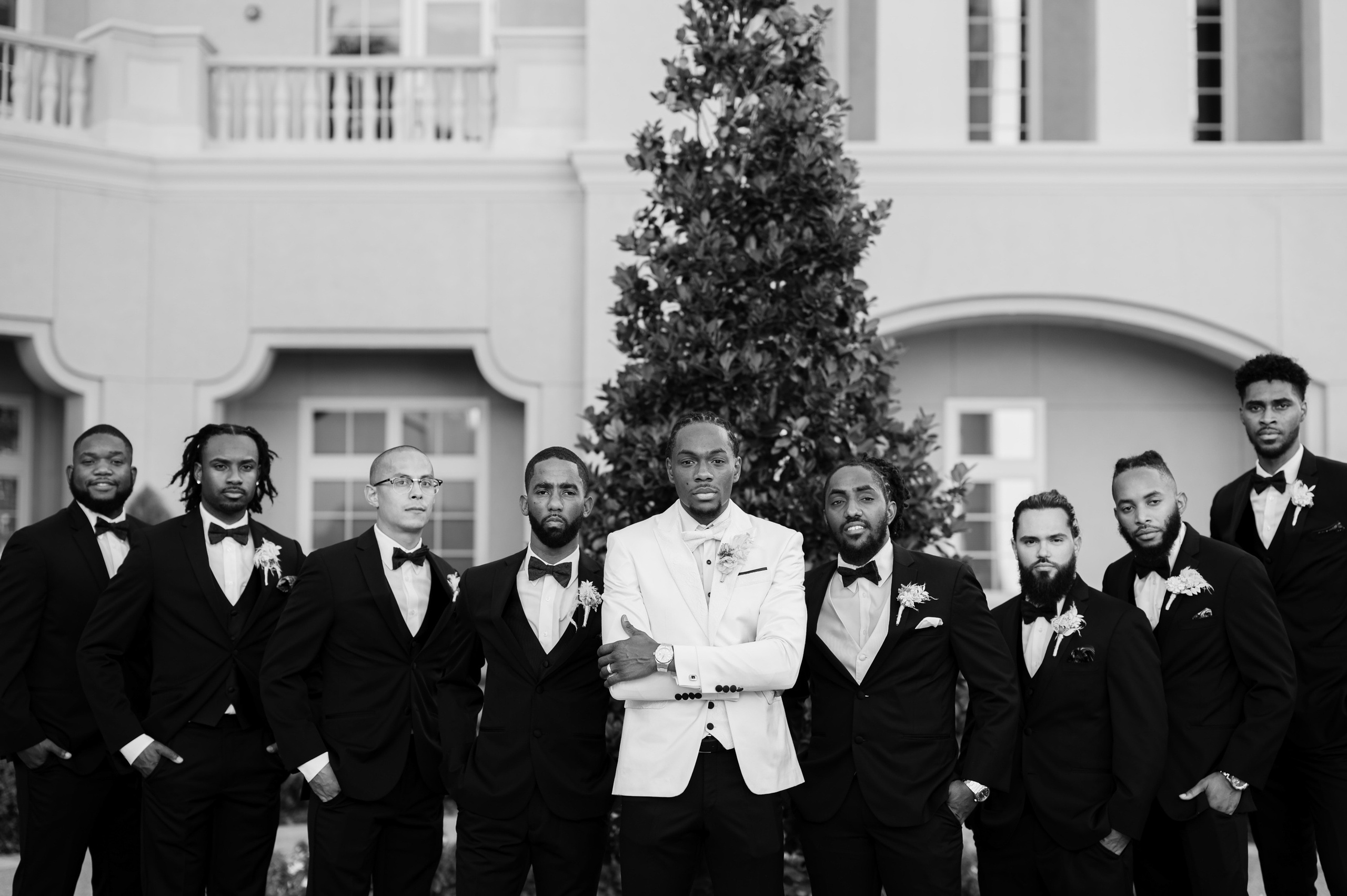 a group of men in tuxed tuxed tuxed tuxed tuxed tuxed tuxed tuxed tuxed tuxed tuxed tu