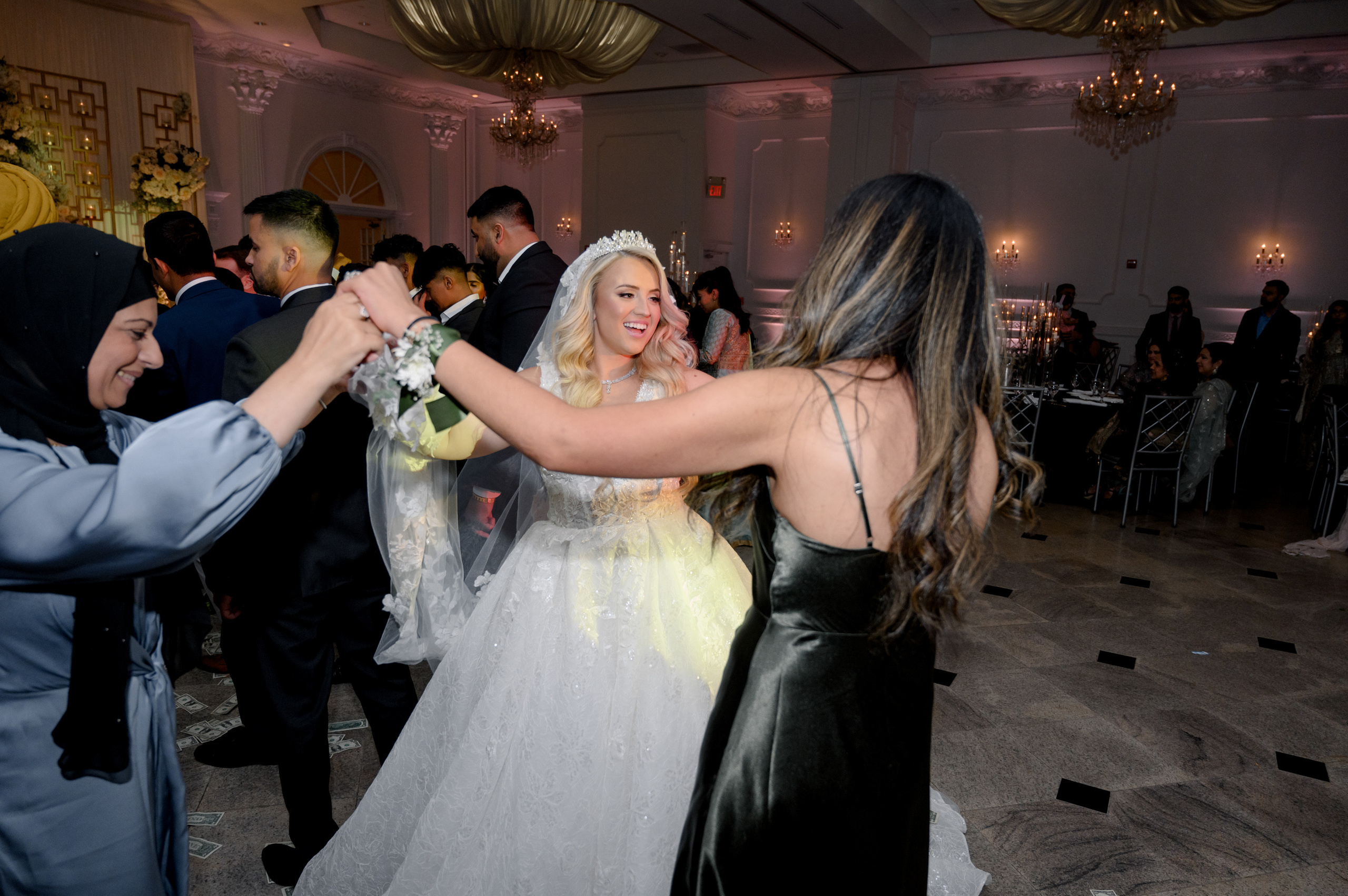 a bride and groom cutting a cake together
