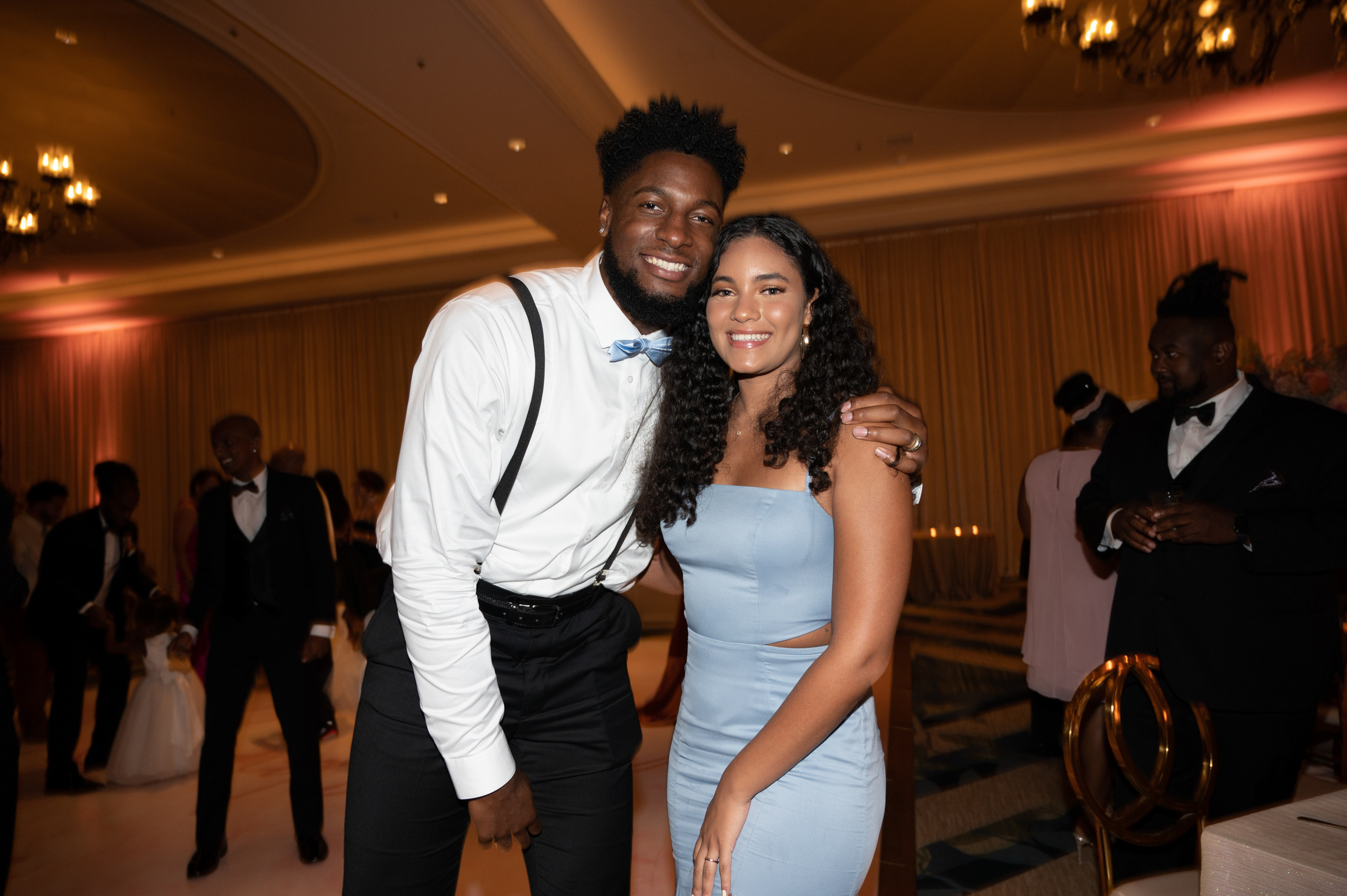 a man and woman posing for a picture