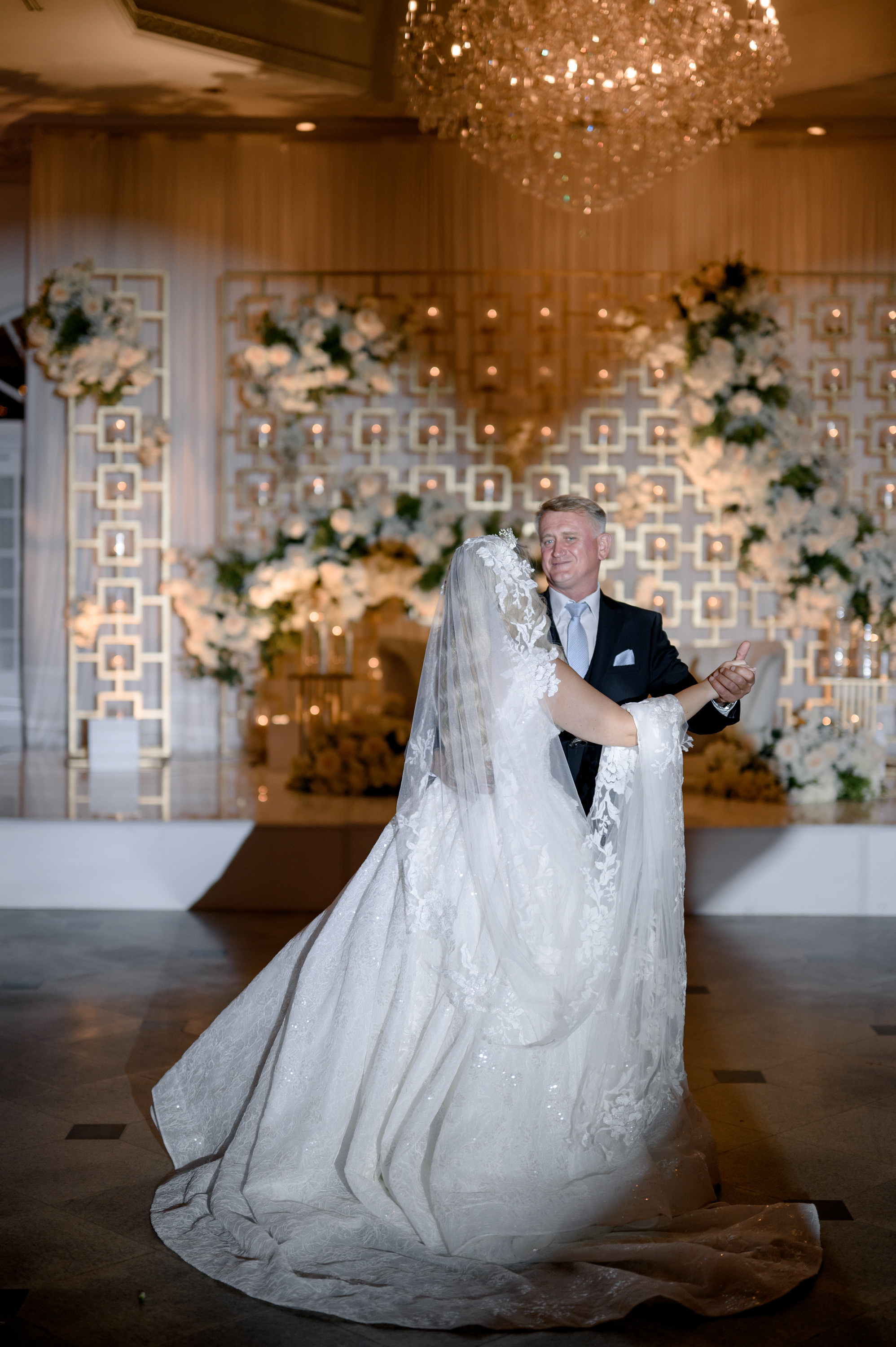 a bride and groom are posing for a photo