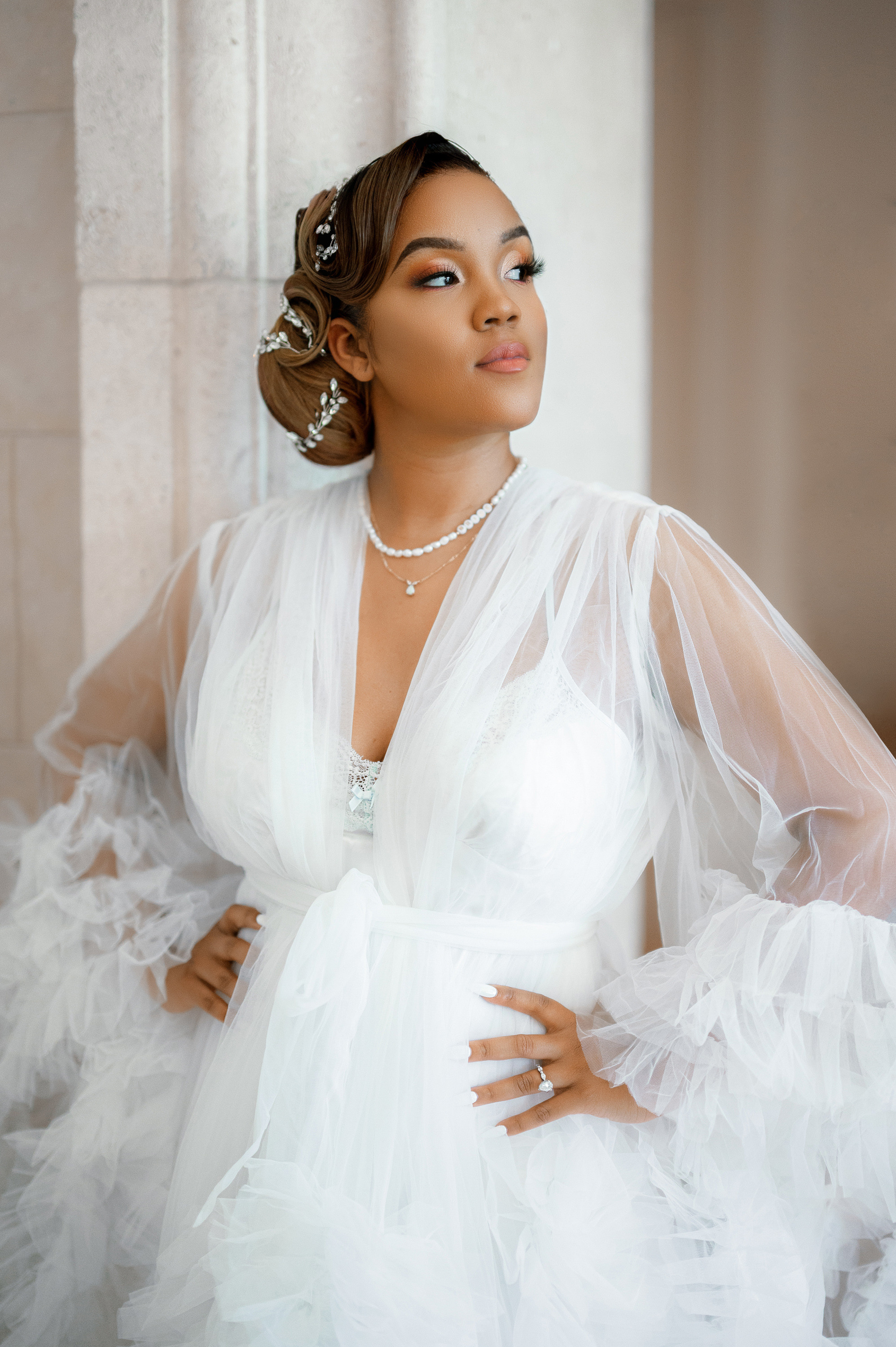 a woman in a white dress and veil