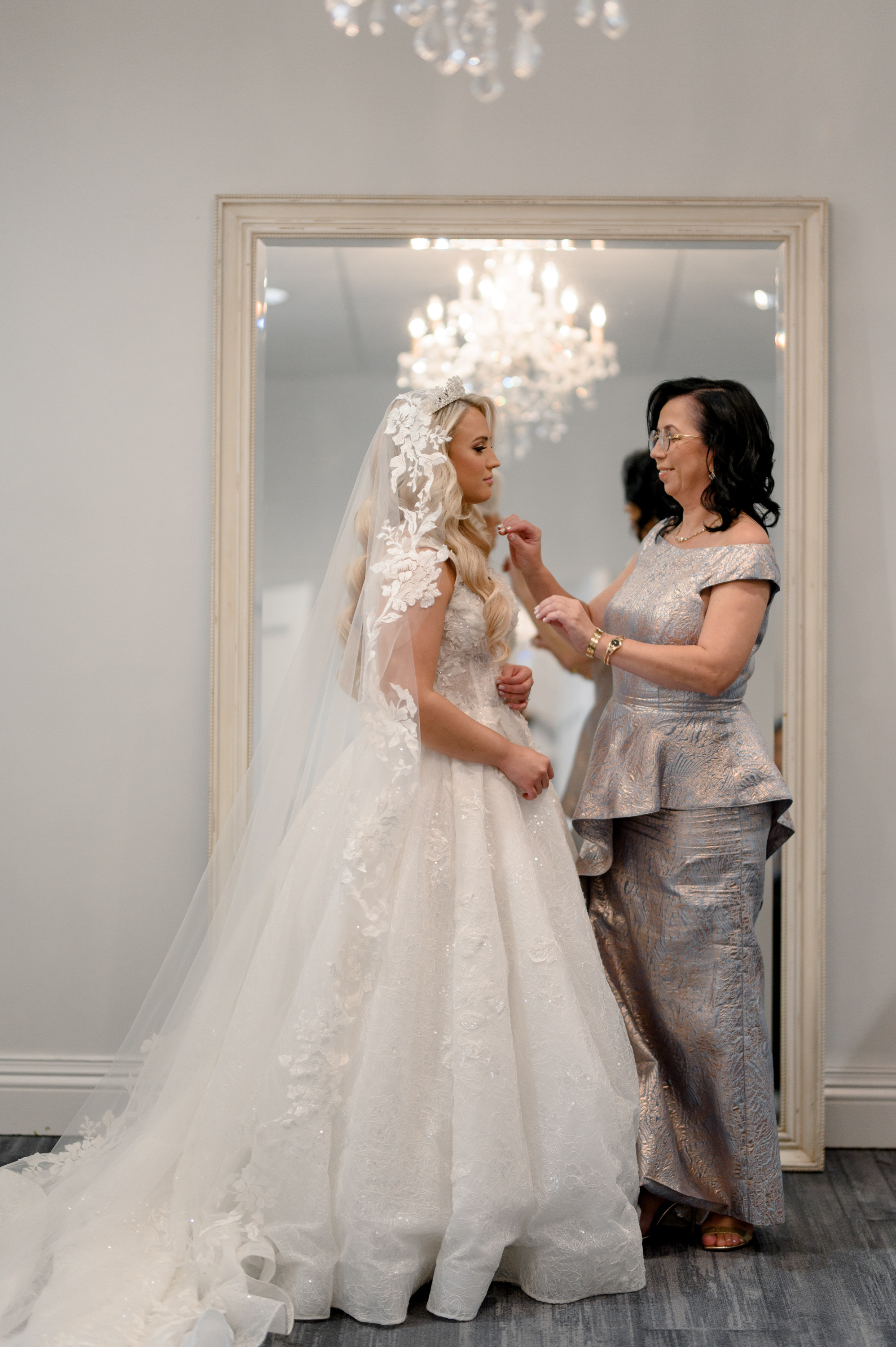 a bride getting her dress on