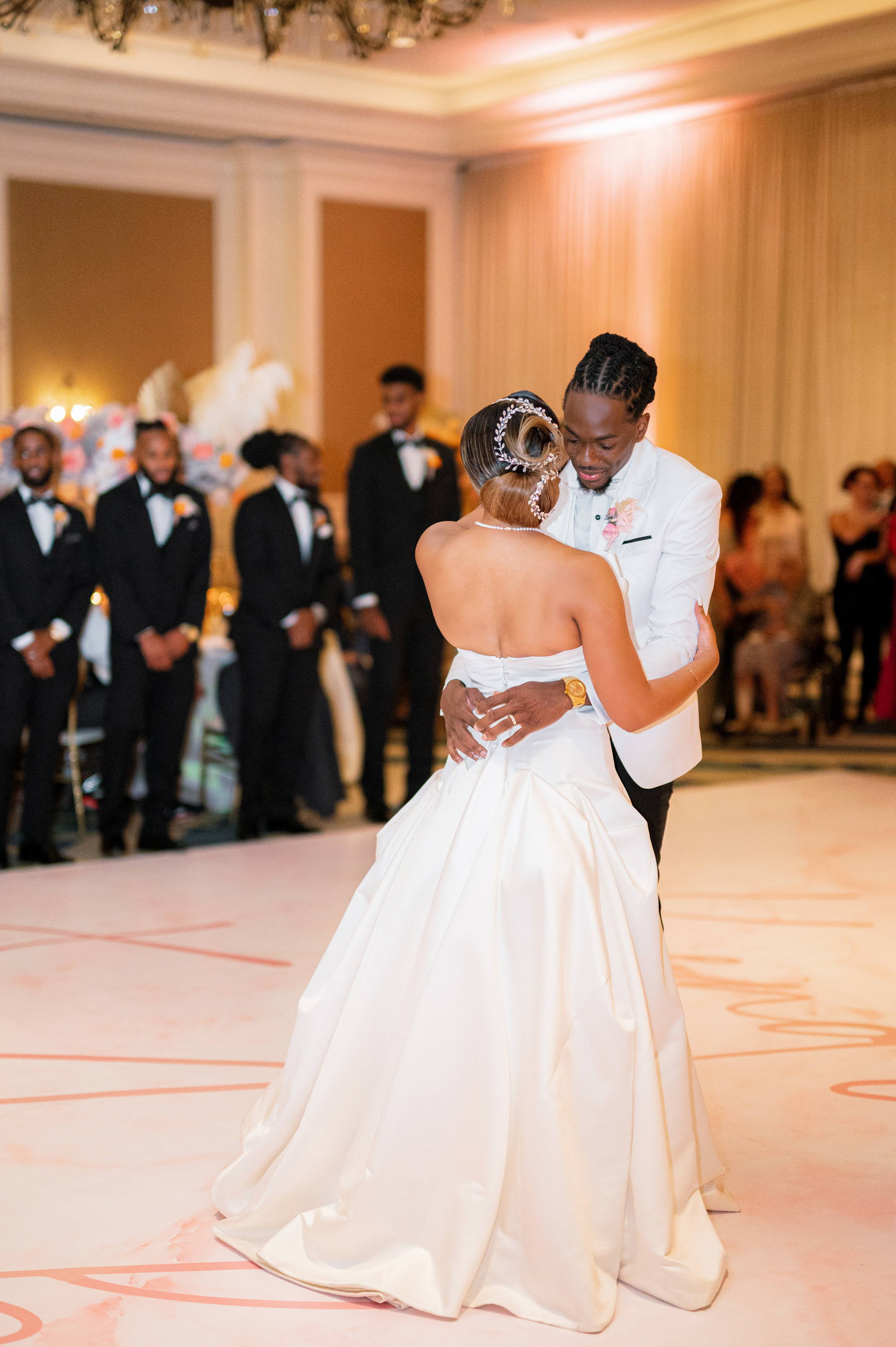 a bride and groom sharing a first dance